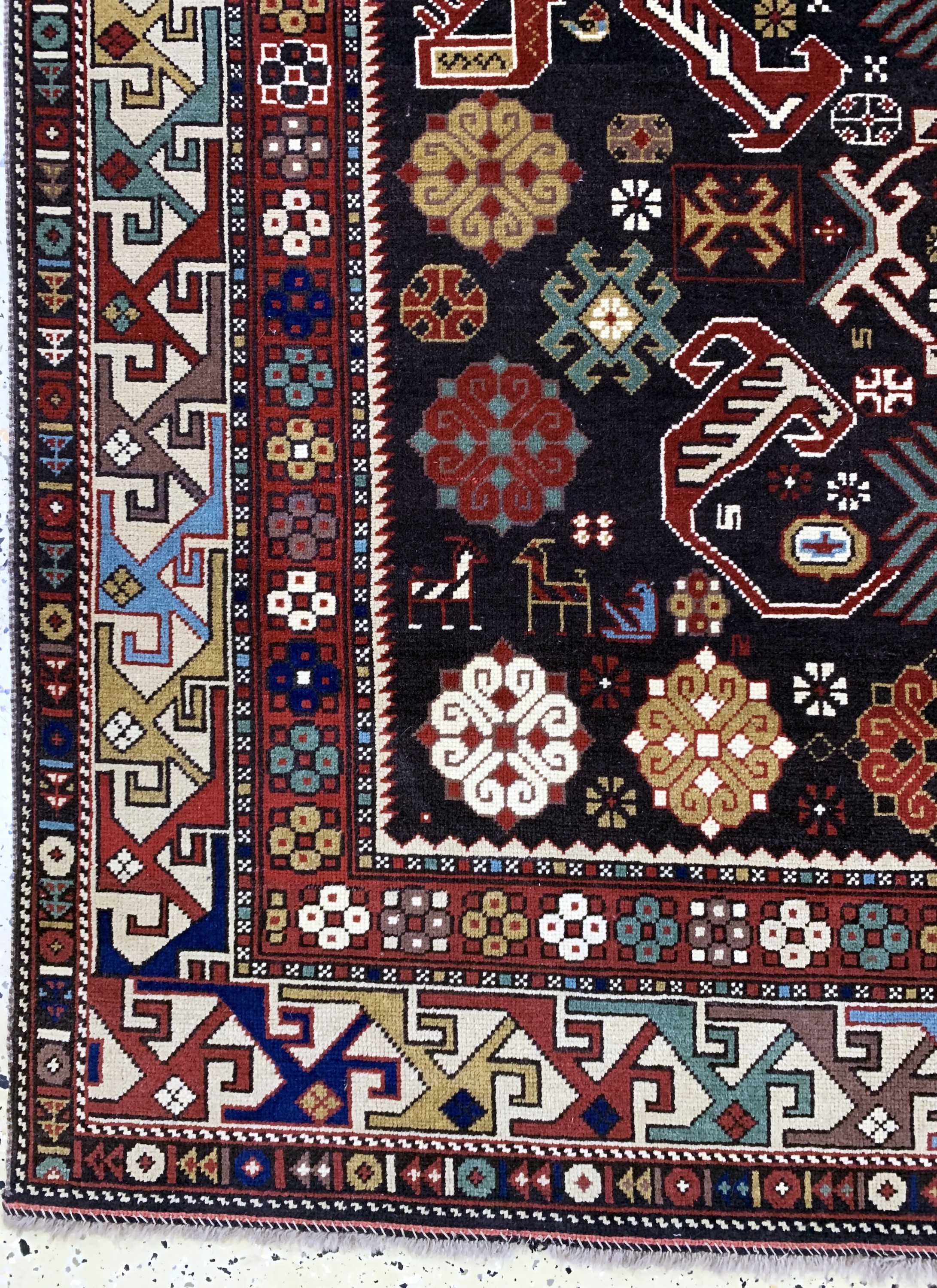 Detail b: Kazak alt, Kaukasus, Mitte 20.Jhd, Wolle auf Wolle, ca. 233 x 173 cm, EHZ: 2