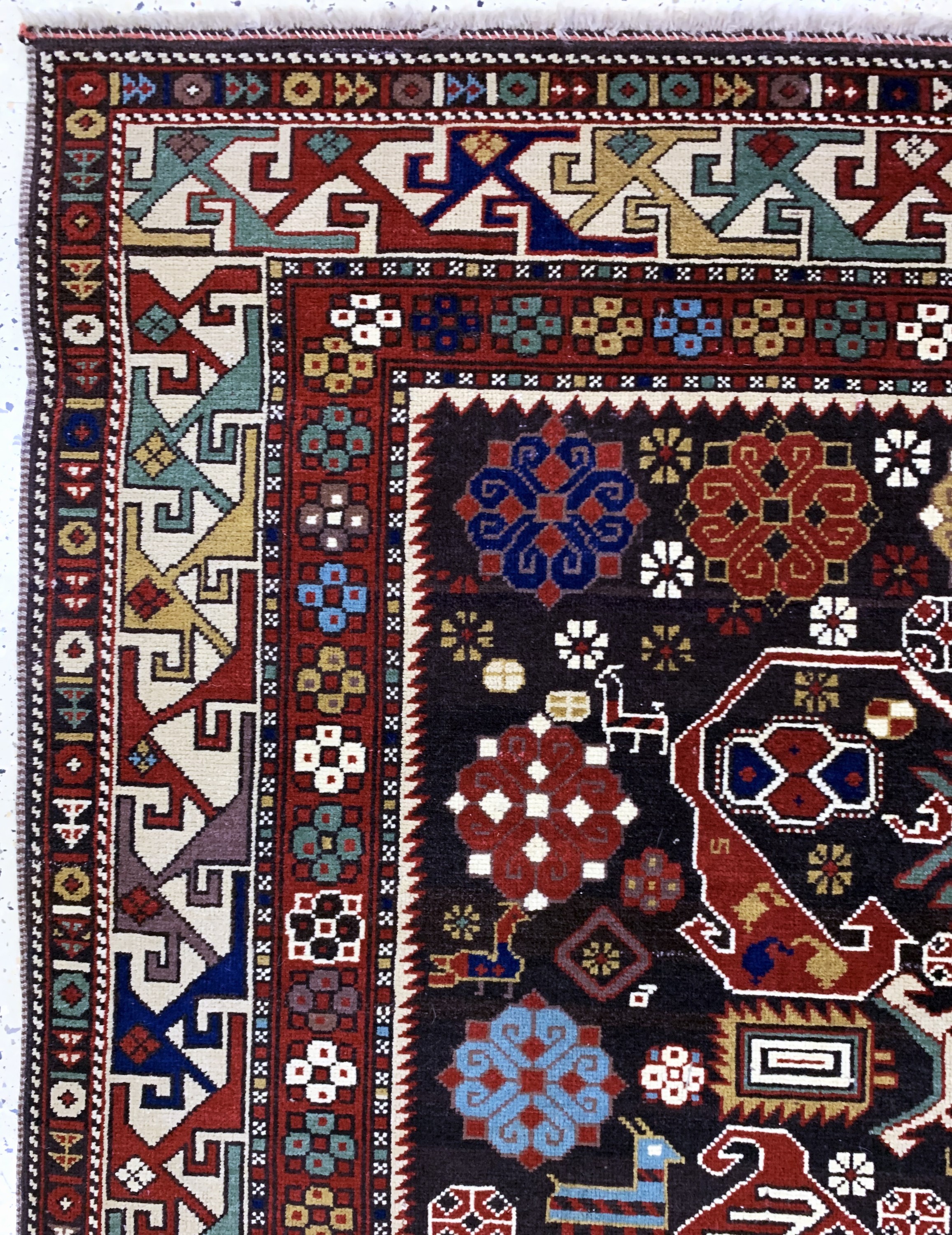 Detail d: Kazak alt, Kaukasus, Mitte 20.Jhd, Wolle auf Wolle, ca. 233 x 173 cm, EHZ: 2