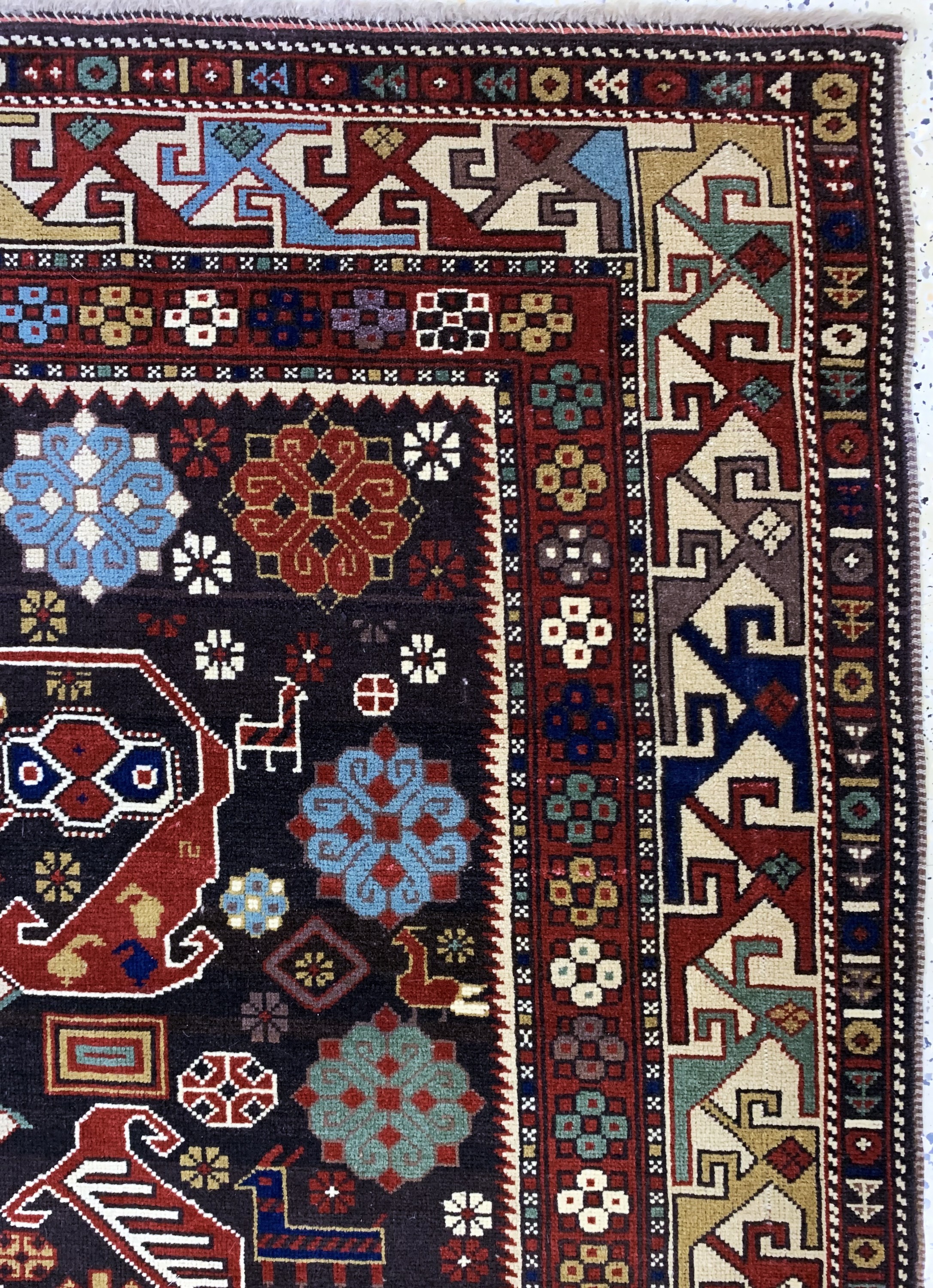 Detail e: Kazak alt, Kaukasus, Mitte 20.Jhd, Wolle auf Wolle, ca. 233 x 173 cm, EHZ: 2