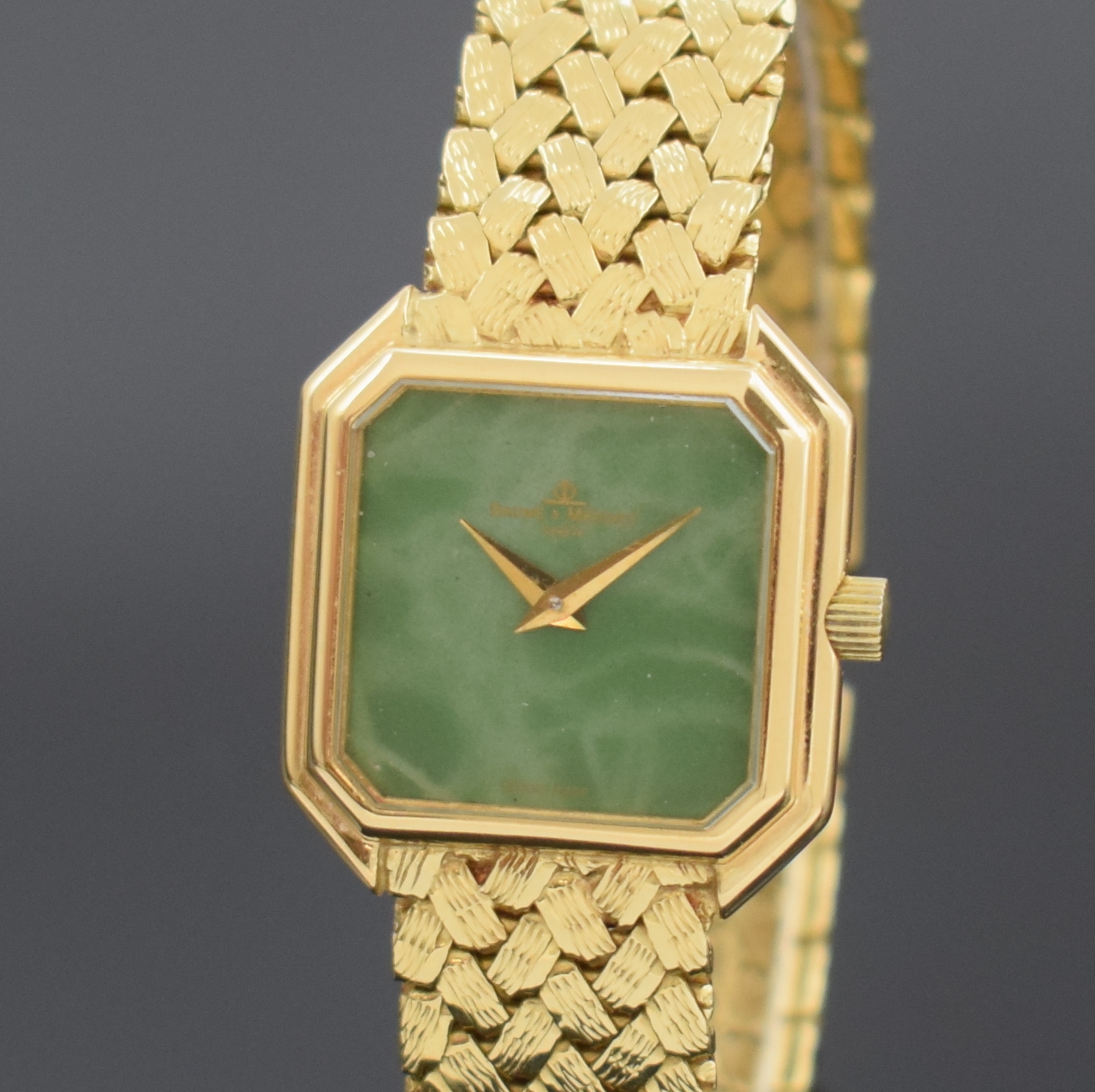 Detail a: BAUME & MERCIER Damenarmbanduhr in GG 750/000 Referenz 38259, Schweiz um 1985, Handaufzug, 8-eckiges Geh., Boden aufgedr., anges. Flechtband, grünes ...