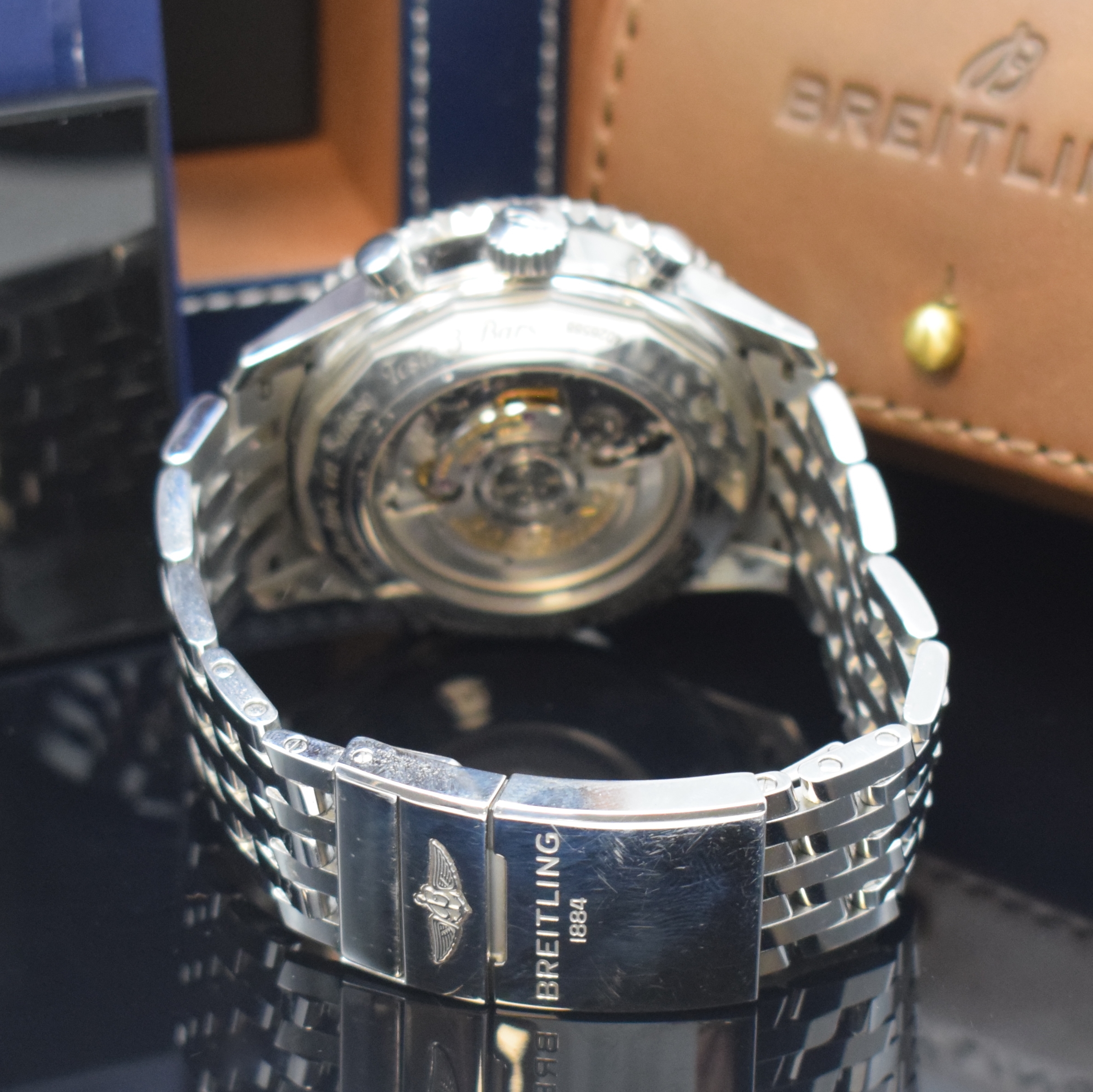 Detail b: BREITLING Armbandchronograph Navitimer GMT Referenz AB0441, Automatik, Chronometer in Edelstahl inkl. orig. Gliederband m. Faltschl., zus. orig. ...