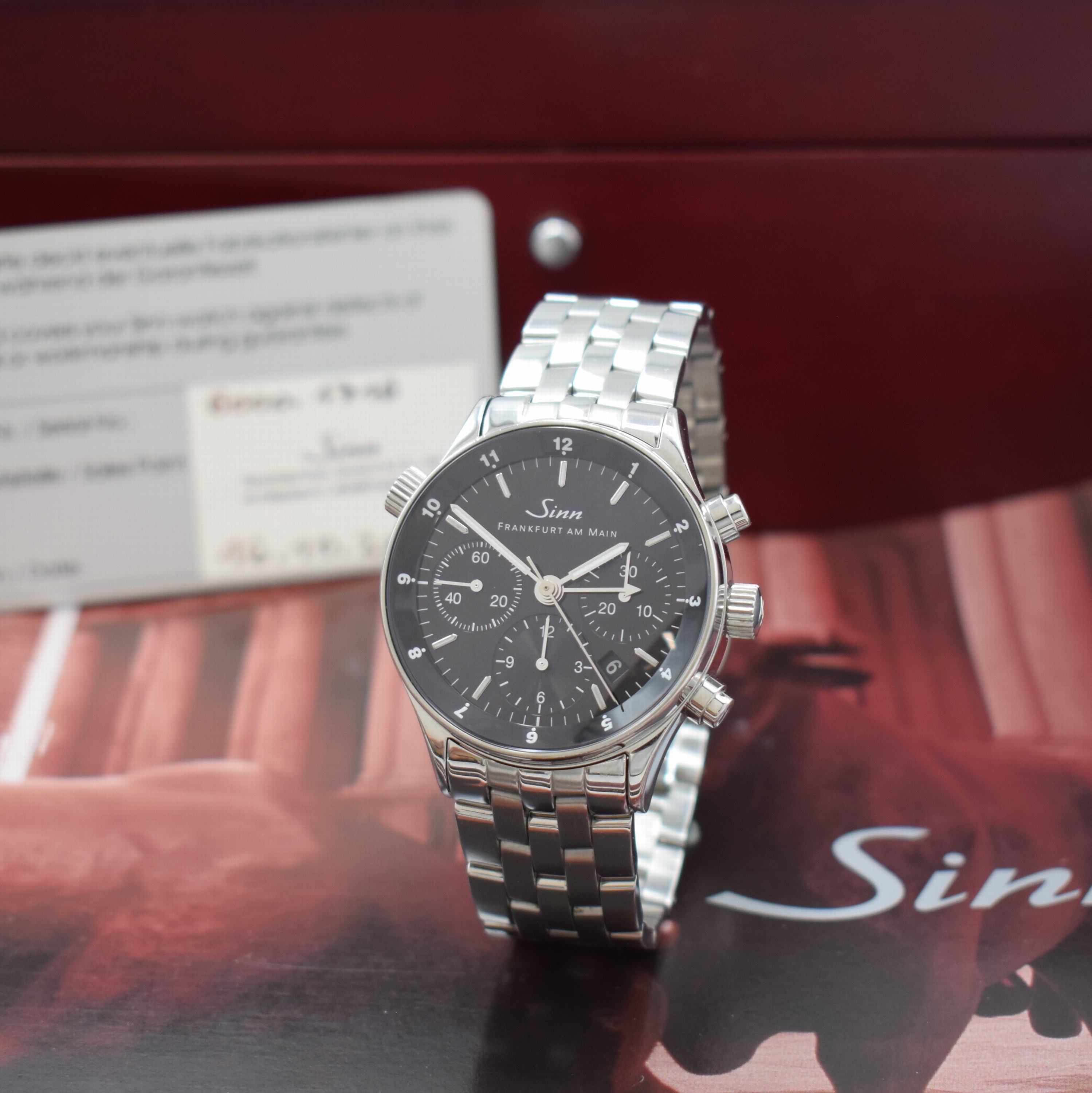 SINN Herrenarmbanduhr "Die Finanzplatzuhr" Referenz 6000, Automatik, Edelstahlgeh. inkl. Gliederband m. dopp. Faltschl., beids. ...