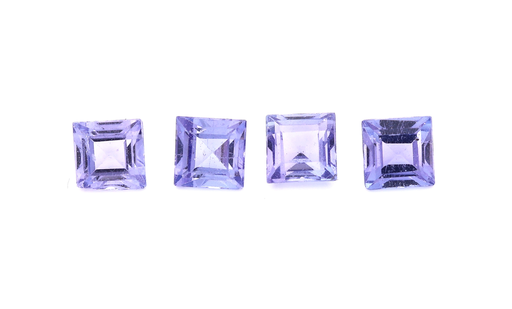 Lot 4 lose Tansanite, zus. ca. 1.54 ct, facett. Carrees