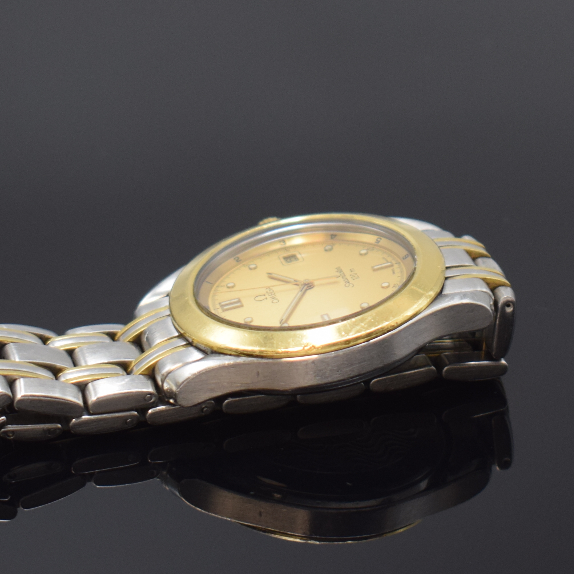 Detail d: OMEGA Herrenarmbanduhr Serie Seamaster Referenz 196.1501, Schweiz 1990er Jahre, Edelstahl/Gold kombiniert inkl. Gliederband m. Faltschl., bomb. ...