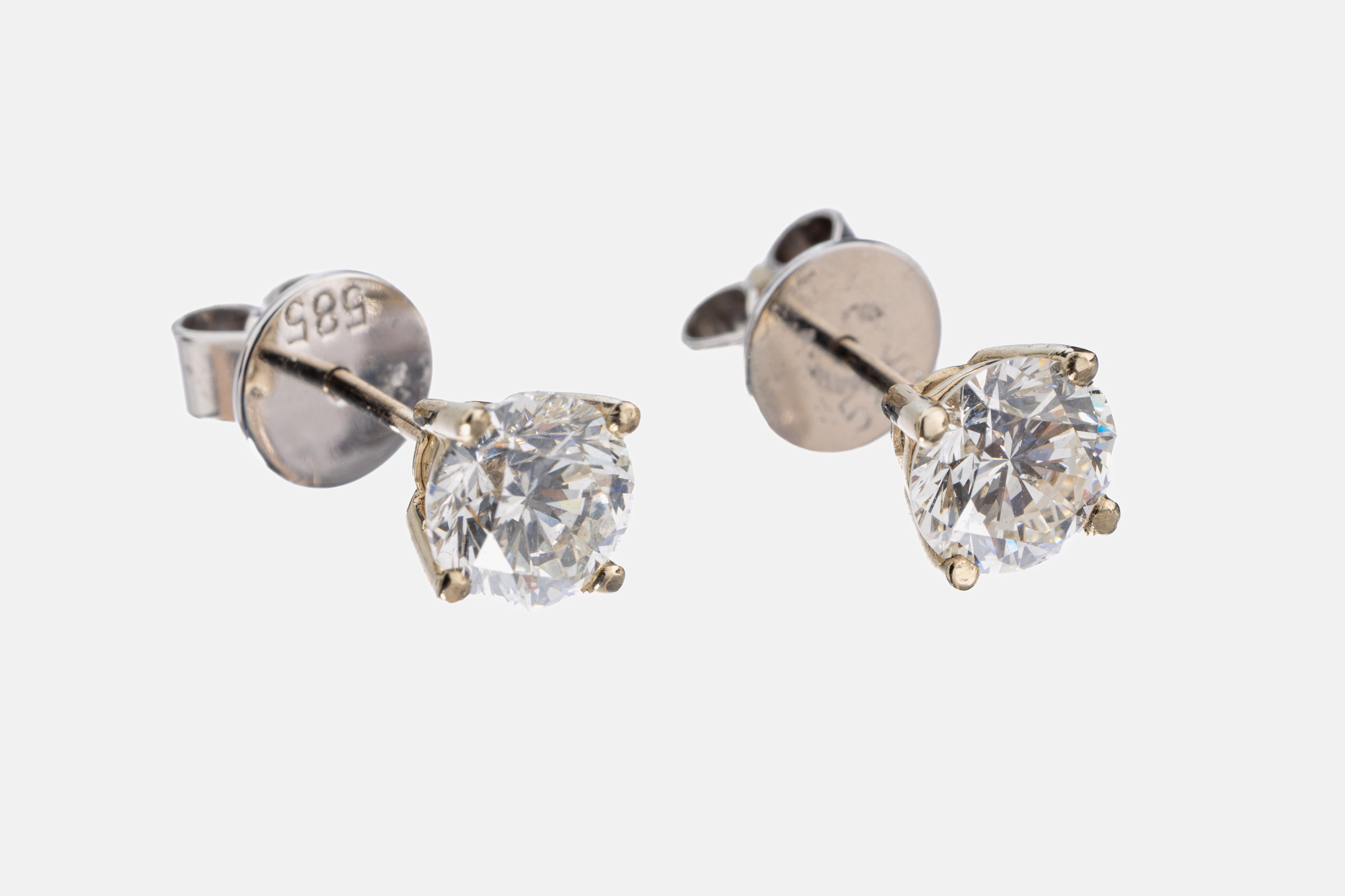 Paar 14 kt Gold Brillant-Ohrstecker, WG 585/000, 2 Brillanten zus. ca. 2.08 ct Weiß (H)/si2, IGI Expertisen anbei
