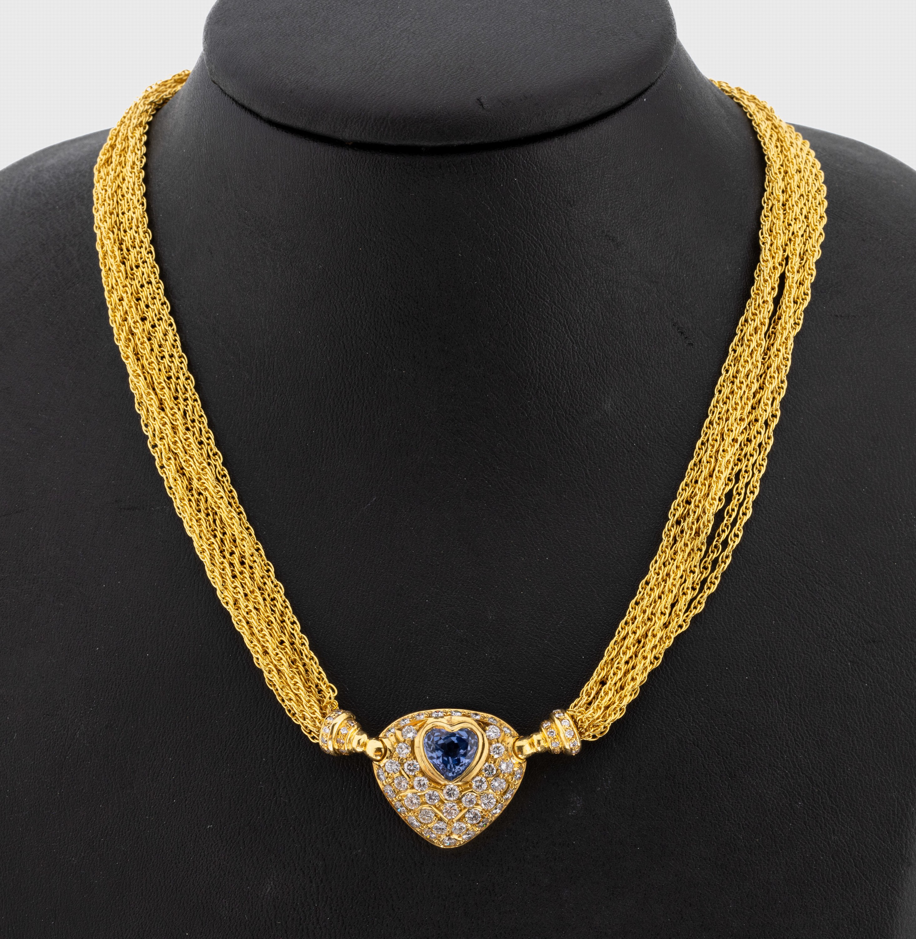18 kt Gold Saphir-Brillant-Collier, GG 750/000, qualitätvolle Verarbeitung, 10 rhg. Kette, Mittelteil mit 1 herzf. facett. Saphir ca. 2.80 ct, 63 ...