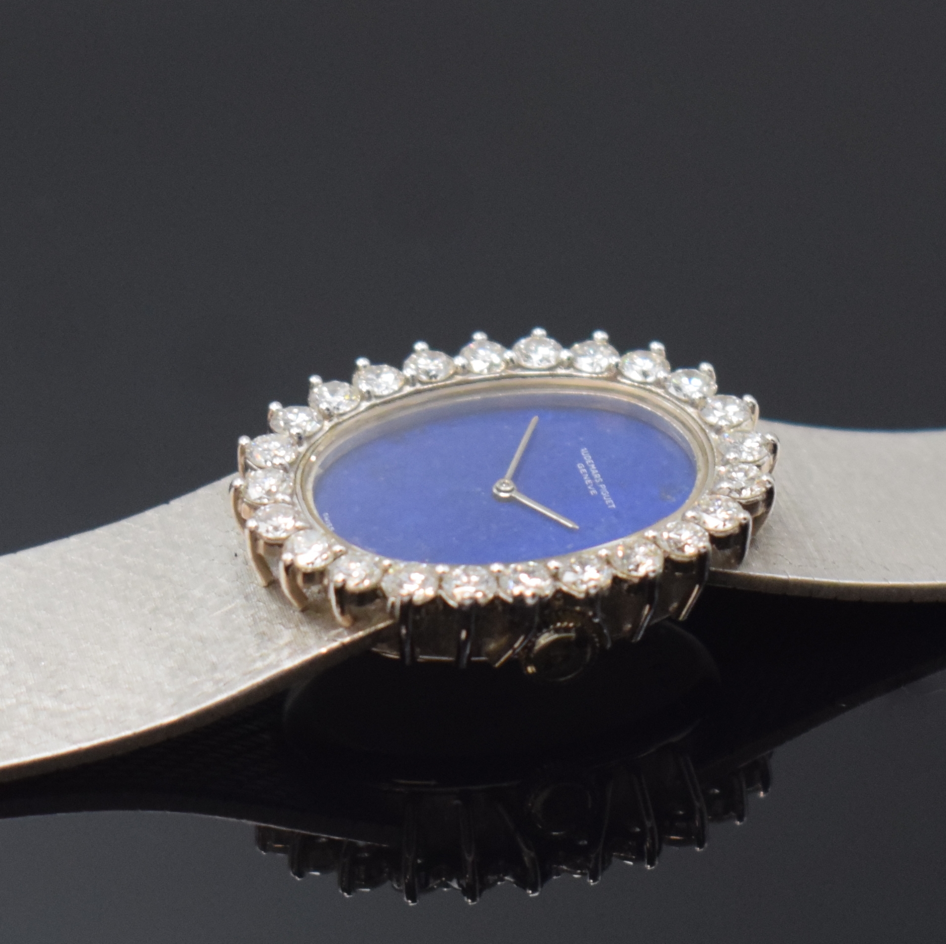 Detail c: AUDEMARS PIGUET feine Damenarmbanduhr in WG 750/000, Handaufzug, Schweiz um 1970, 2- teil. Geh., Boden aufgedr., Milanaiseband, Lünette aufw. m. ...