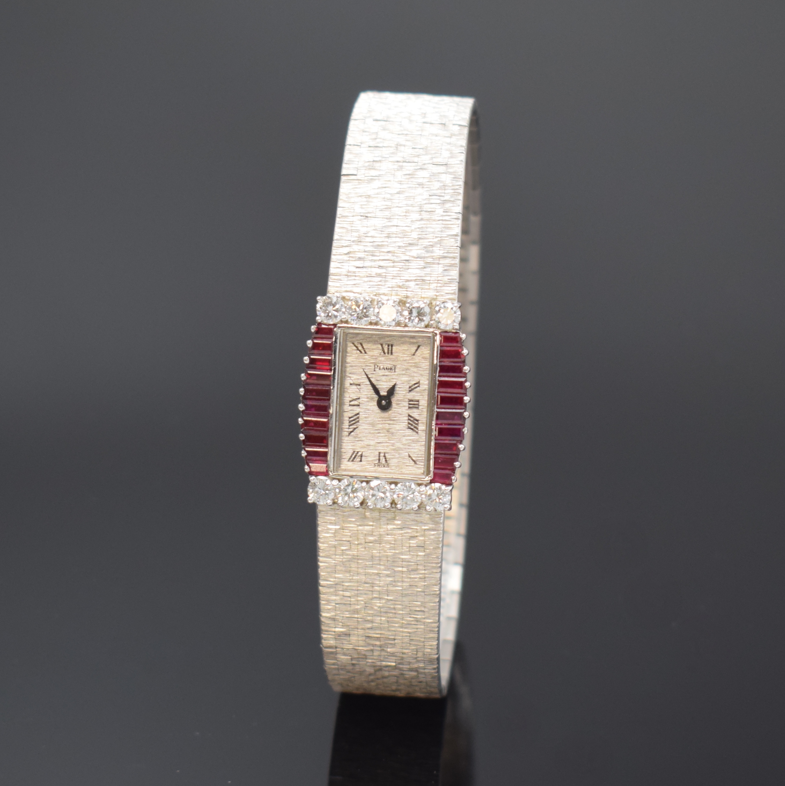 PIAGET feine und seltene Damenarmbanduhr in WG 750/000 mit Diamanten und Rubinen Referenz 3876 A6, Schweiz 1970er Jahre, Handaufzug, 4-fach verschr. ...