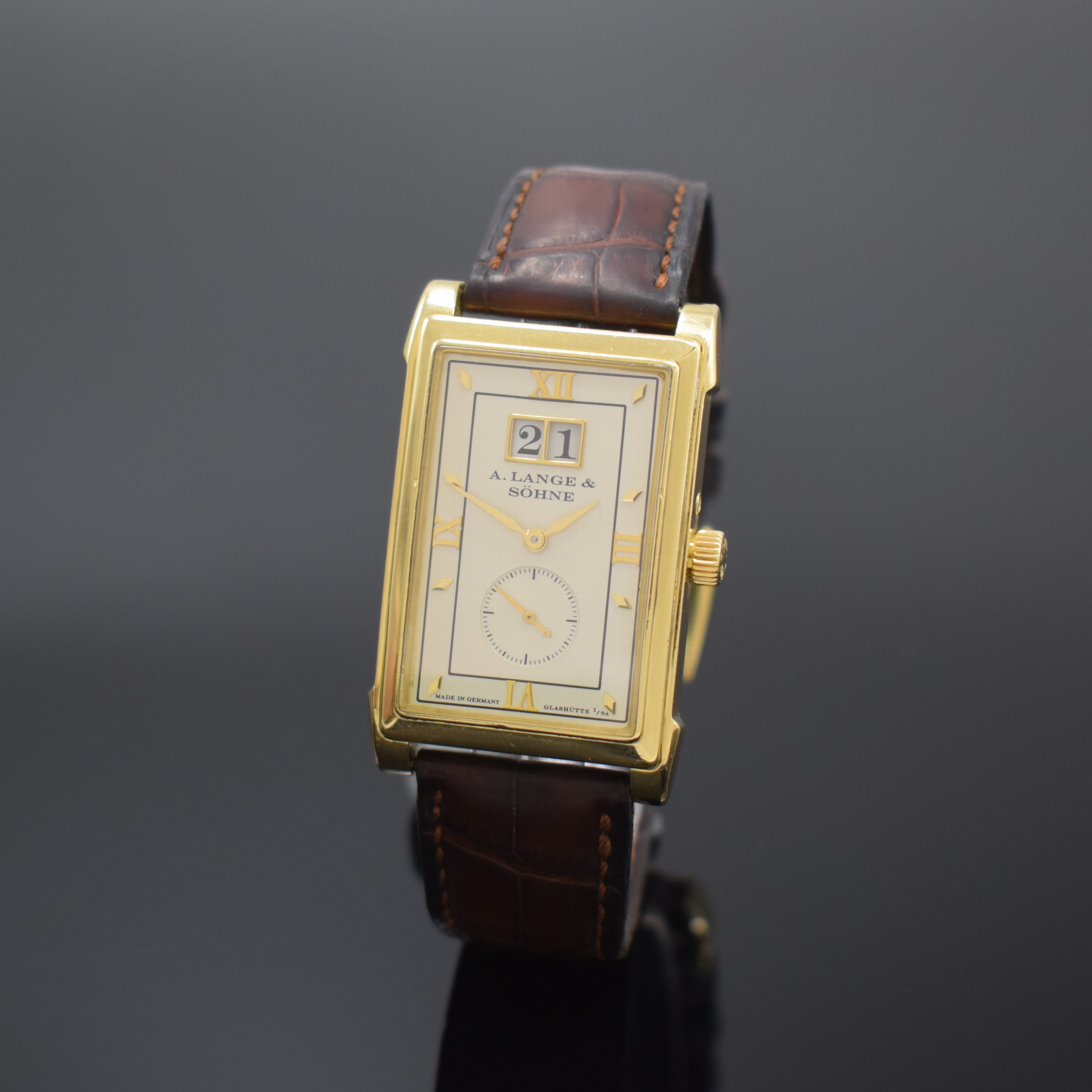 A. LANGE & SÖHNE Armbanduhr Cabaret in GG 750/000 Referenz 107.021, Handaufzug, beids. vergl. Geh. inkl. orig. Lederband m. orig. GG 750/000 ...