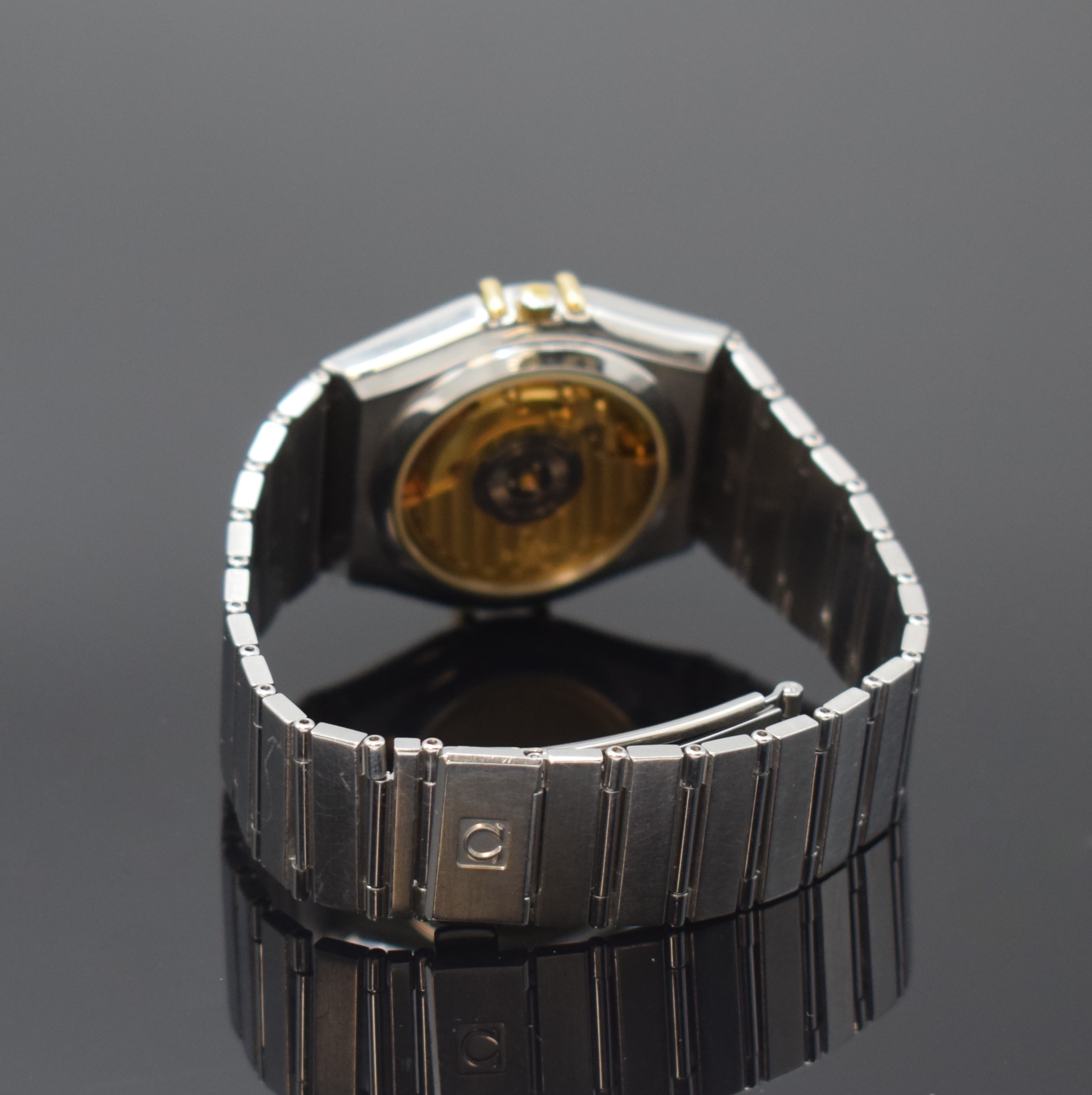 Detail b: OMEGA Constellation Chronometer Herrenarmbanduhr in Stahl/Gold Referenz 368.1075.2, Schweiz um 1985, Automatik, beids. vergl. Stahlgeh., Goldlünette ...