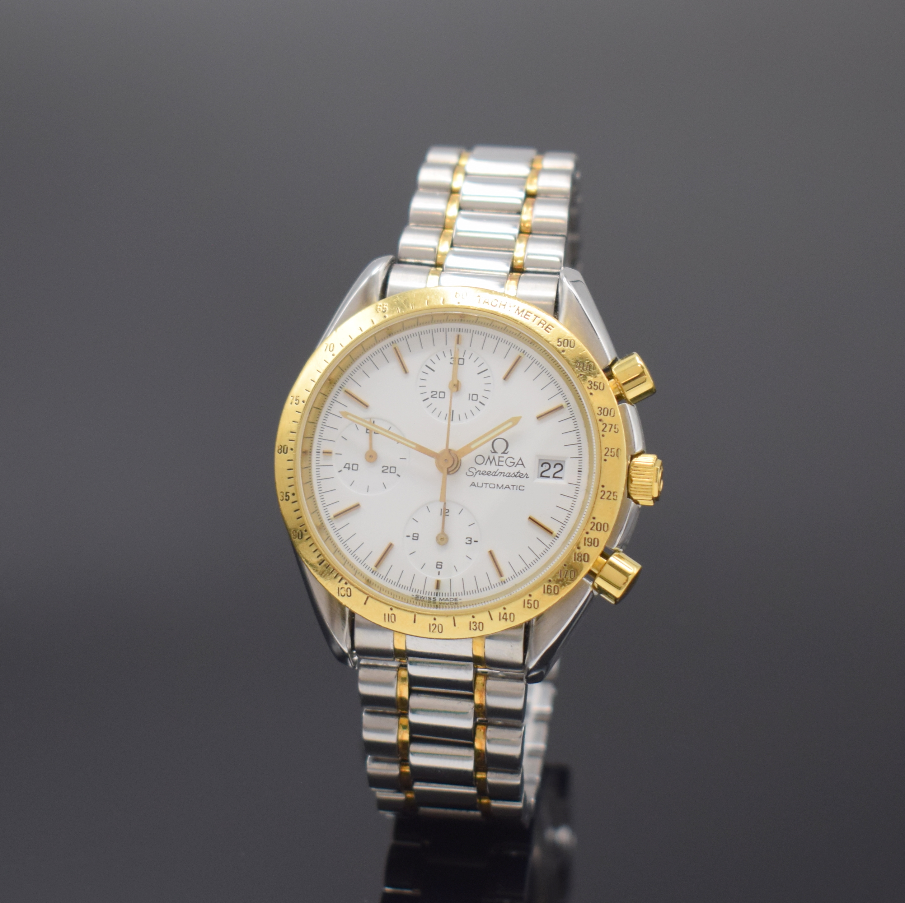 OMEGA Speedmaster Herrenarmbanduhr mit Chronograph Referenz 175.0043/375.0043, Schweiz um 1995, Edelstahl/Gold komb., inkl. Gliederband m. Faltschl., ...