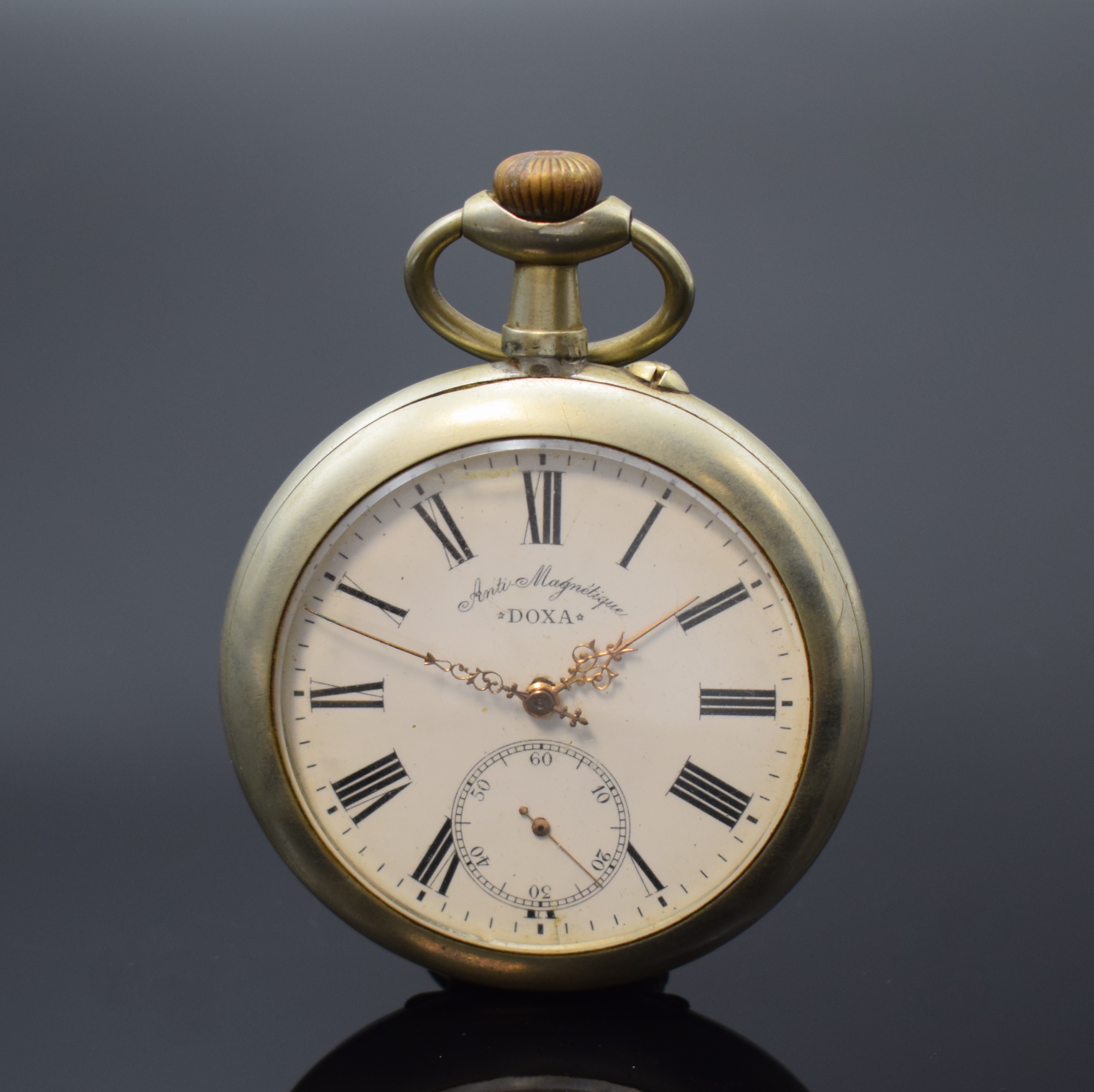DOXA große offene Taschenuhr im Argentan- Gehäuse, Schweiz um 1905, Geh. dell., Cuvette m. Medaillengravur, Emailzifferbl. m. röm. Zahlen l. ...