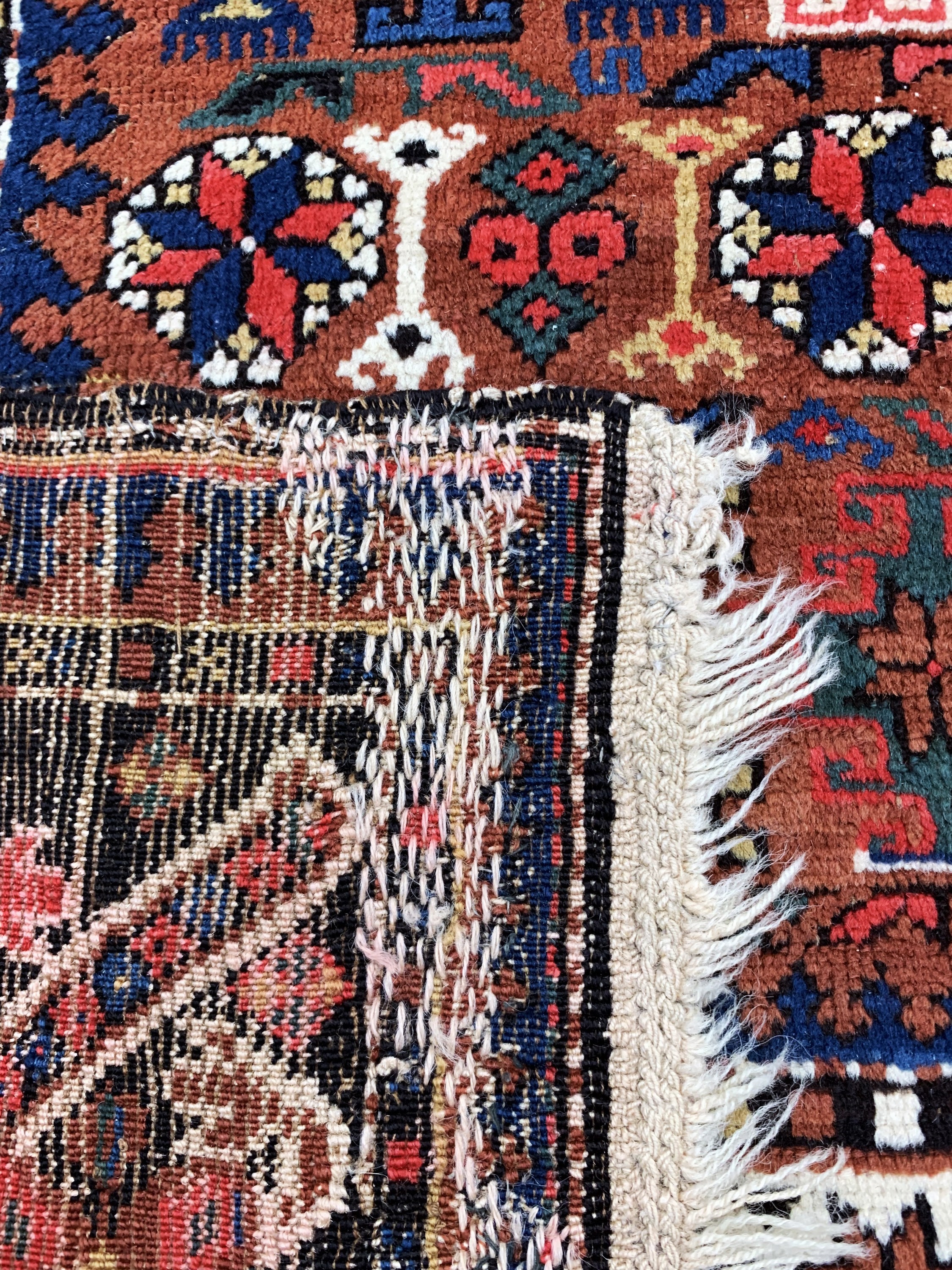 Detail d: Kazak antik, Kaukasus, um 1900, Wolle auf Wolle, ca. 150 x 117 cm, EHZ: 3, (restauriert)