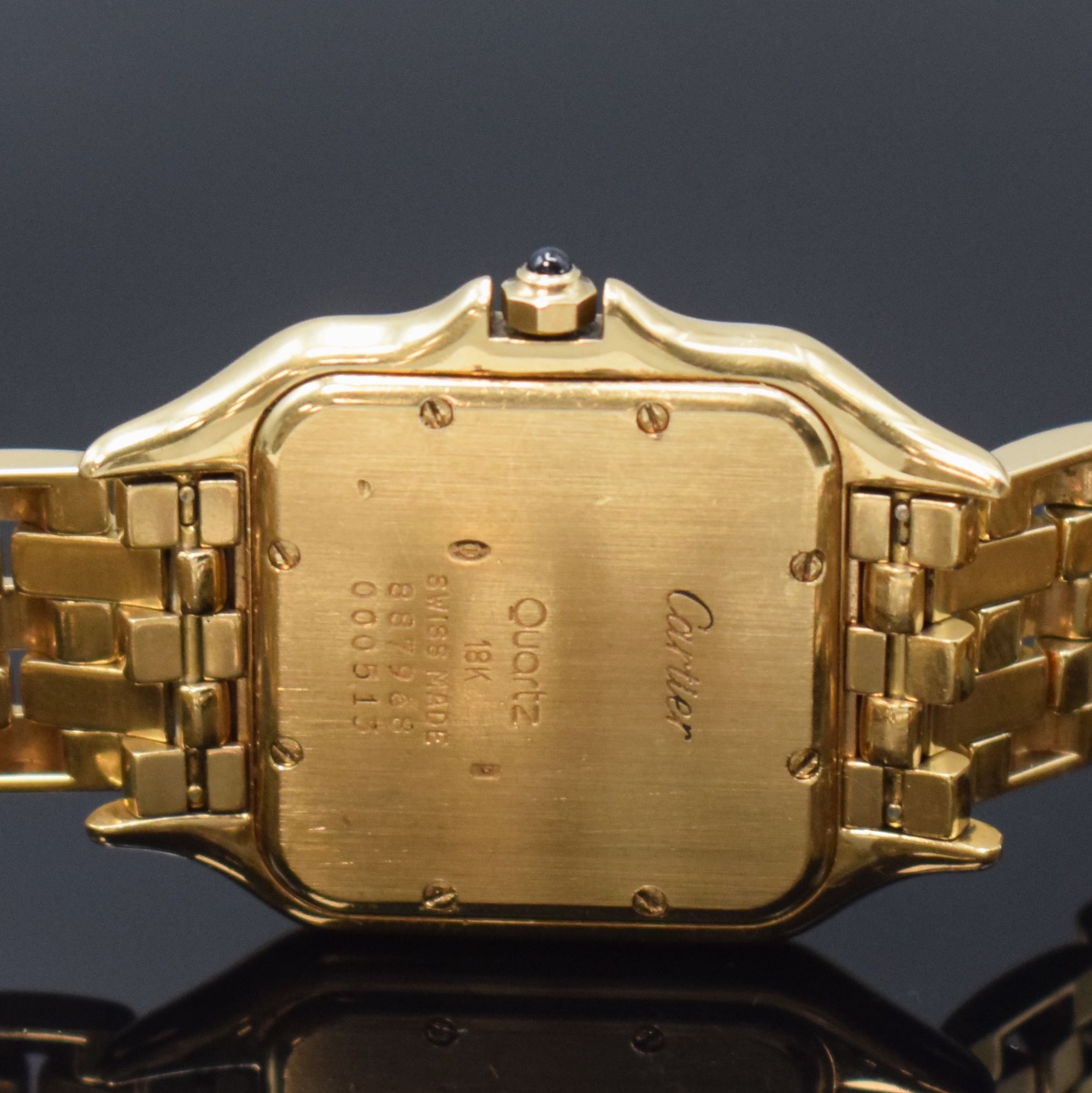 Detail d: CARTIER Panthere Armbanduhr in GG 750/000 mit GG 750/000 Gliederband Referenz 887968, Schweiz um 1990, quarz, massives Goldgehäuse, Boden 8-fach ...