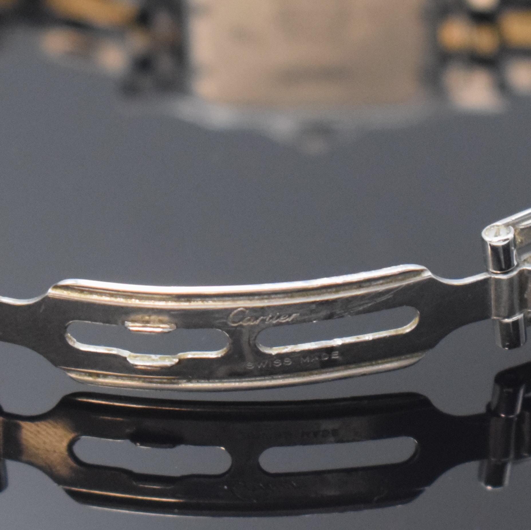 Detail b: CARTIER Panthere Armbanduhr in Stahl/Gold Referenz 187949, Schweiz um 1995, quarz, Boden 8-fach verschr., Gliederband m. dopp. Faltschl., ...