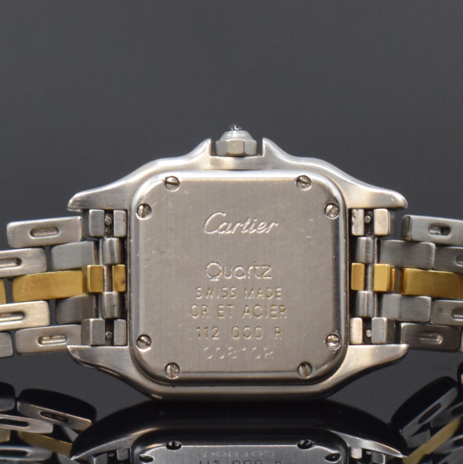 Detail d: CARTIER Panthere Damenarmbanduhr in Stahl/Gold Referenz 1120, Schweiz um 1990, quarz, Boden 8-fach verschr., Schmuckkrone abgebrochen/zu ers., orig. ...