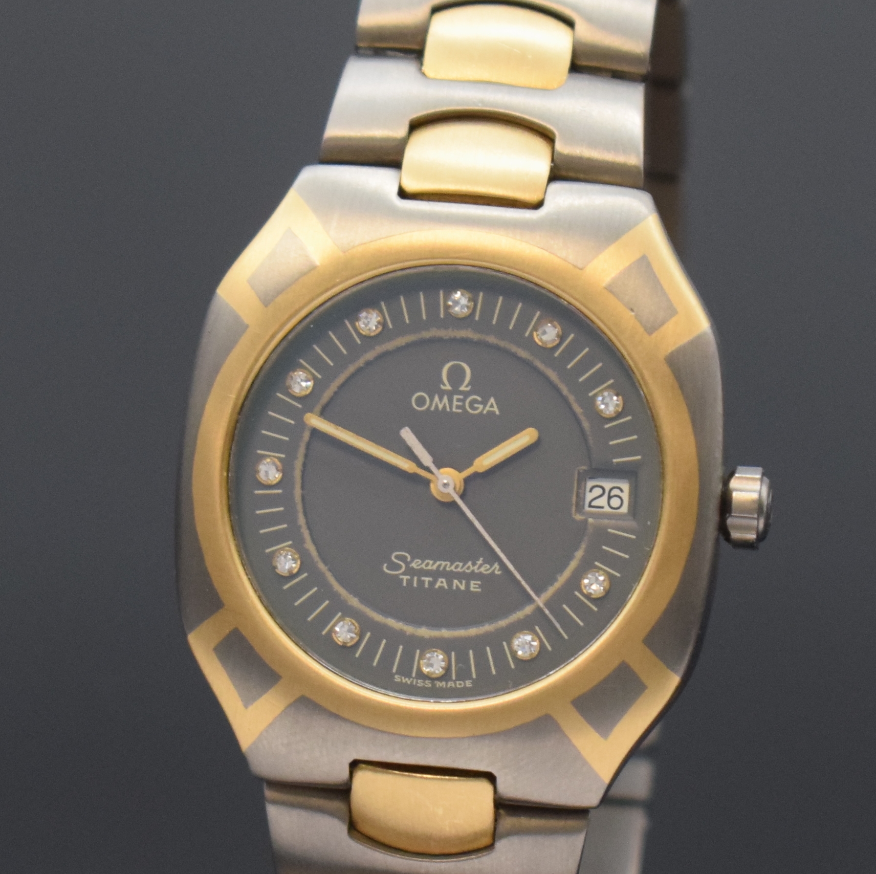 Detail a: OMEGA Seamaster Polaris Armbanduhr Referenz 3961100, Schweiz um 1985, quarz, goldintarsiertes Titangeh. inkl. Gliederband in Titan/Gold m. Faltschl., ...