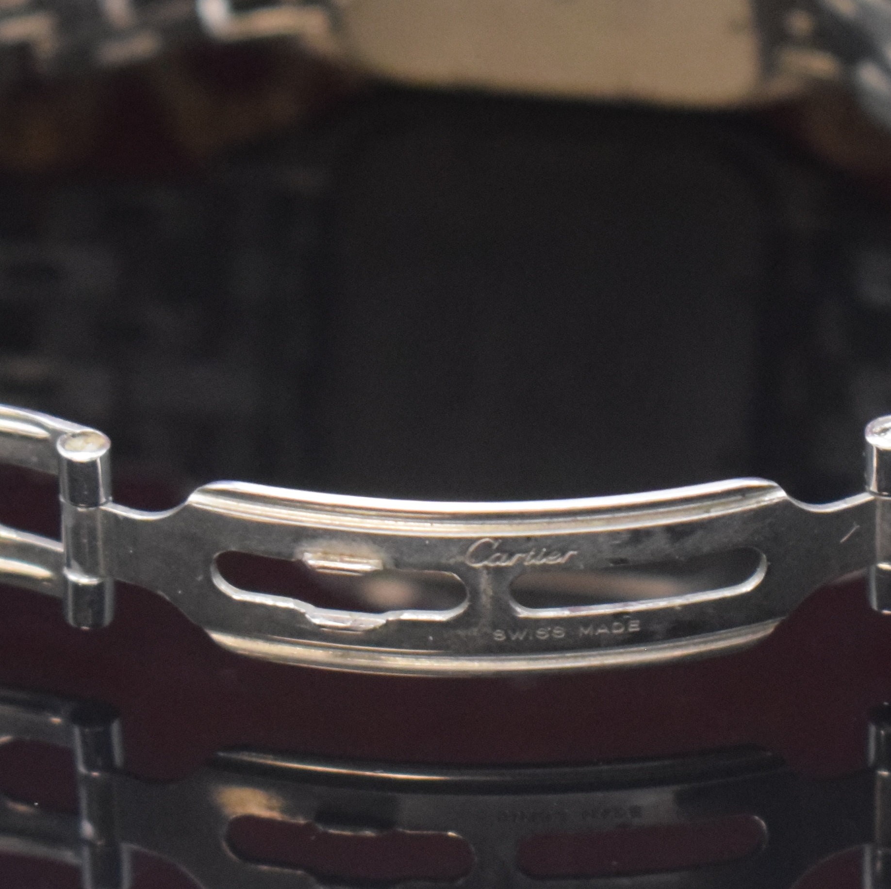 Detail b: CARTIER Panthere Armbanduhr in Edelstahl Referenz 130 000C, Schweiz um 1990, quarz, 2-teil. Gehäuse Boden 8-fach verschr., silb. Zifferbl. m. röm. ...