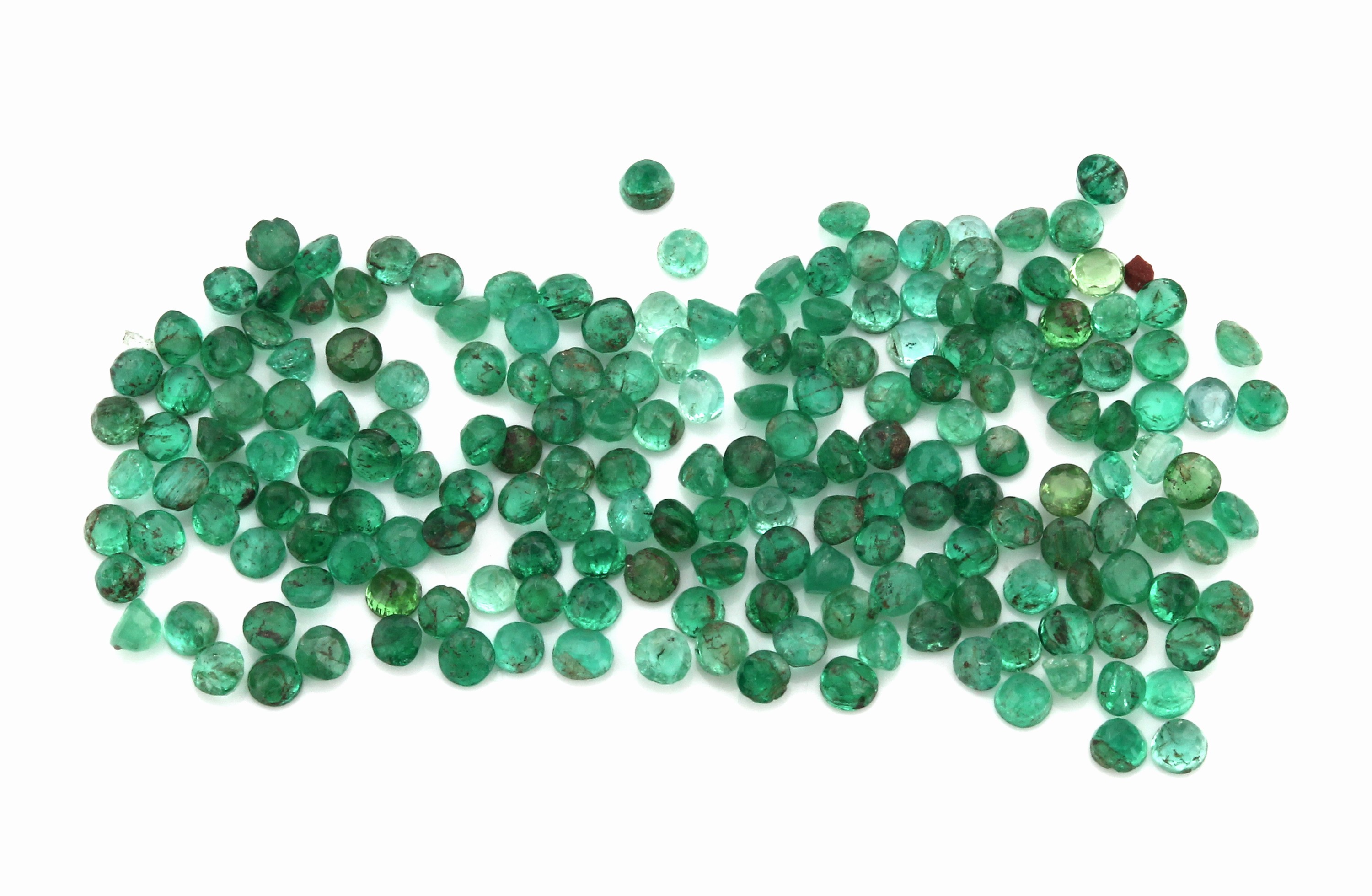 Lot lose Smaragde, zus. ca. 9.52 ct, rund- facett., versch. Farbnuancen, Ausfassware