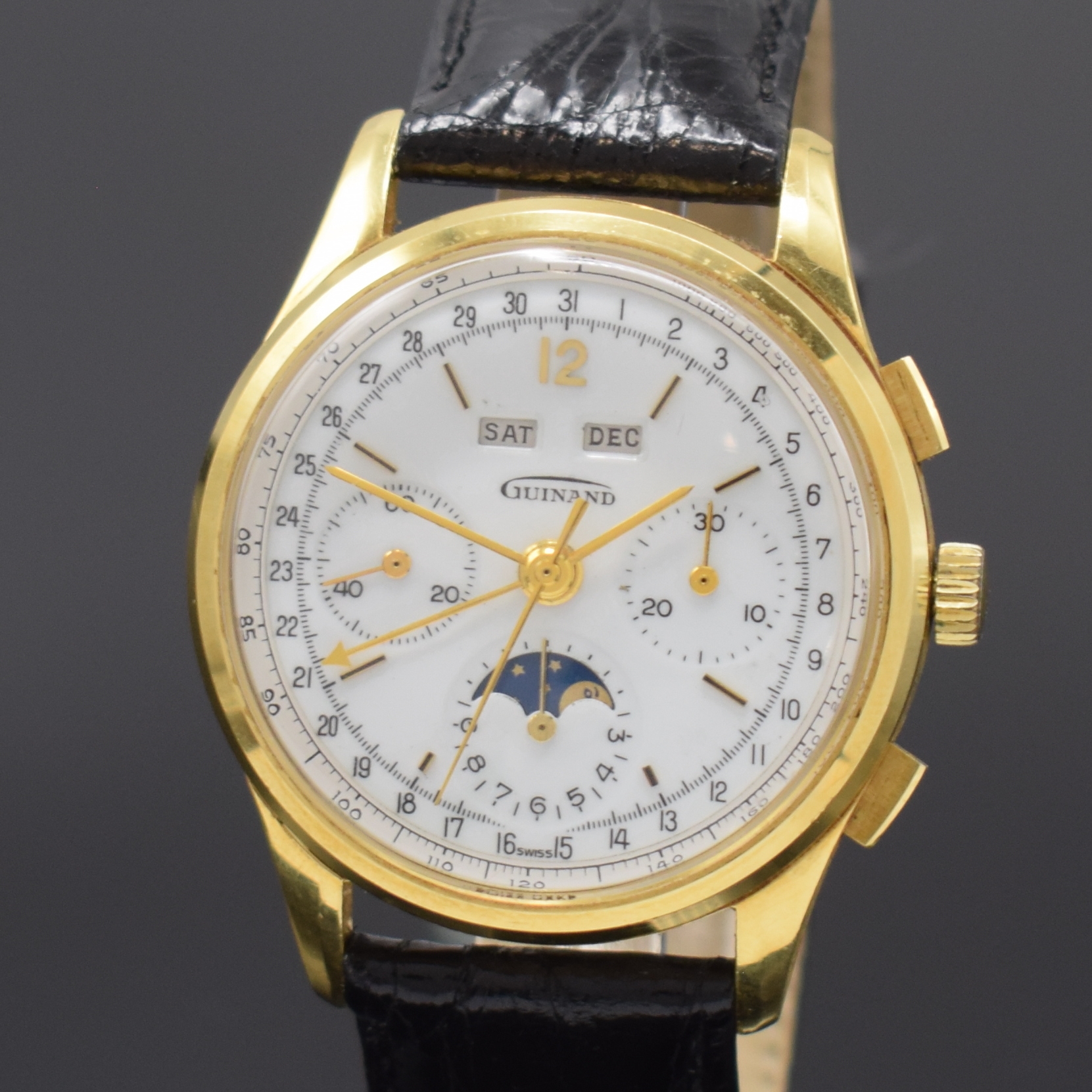 Detail a: GUINAND Herrenarmbanduhr mit Schaltradchronograph und Vollkalender Kaliber Valjoux 726 in GG 750/000, Schweiz um 1980, Handaufzug, 3-teil. Geh., ...