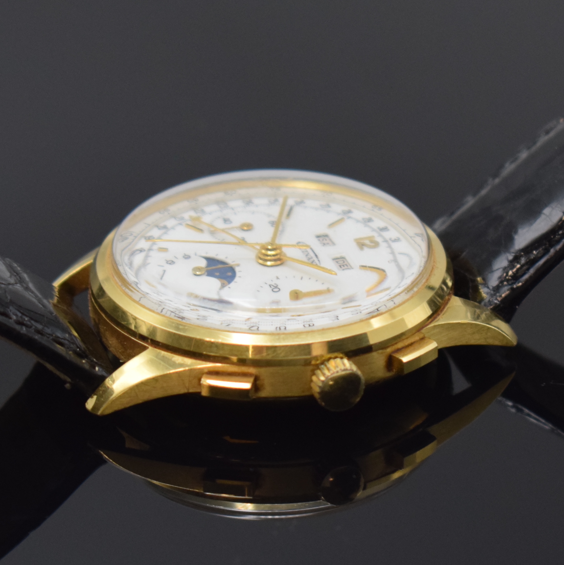 Detail b: GUINAND Herrenarmbanduhr mit Schaltradchronograph und Vollkalender Kaliber Valjoux 726 in GG 750/000, Schweiz um 1980, Handaufzug, 3-teil. Geh., ...