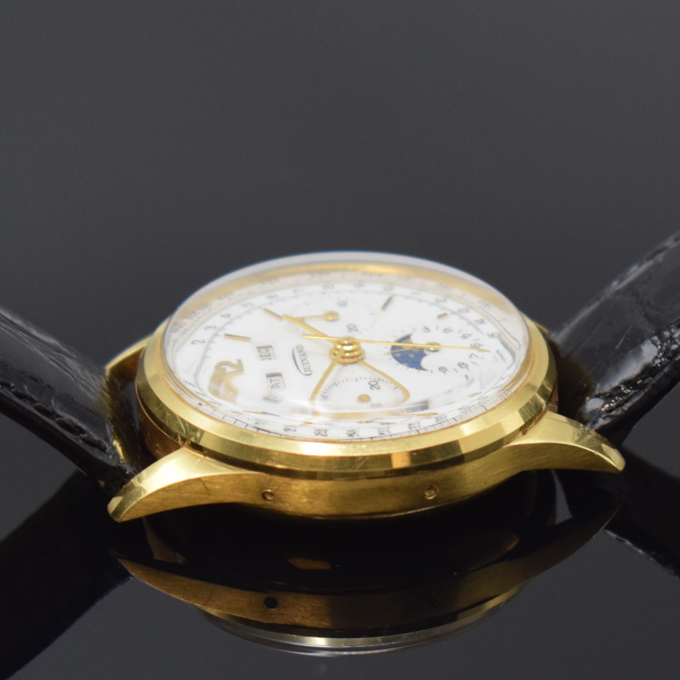 Detail c: GUINAND Herrenarmbanduhr mit Schaltradchronograph und Vollkalender Kaliber Valjoux 726 in GG 750/000, Schweiz um 1980, Handaufzug, 3-teil. Geh., ...
