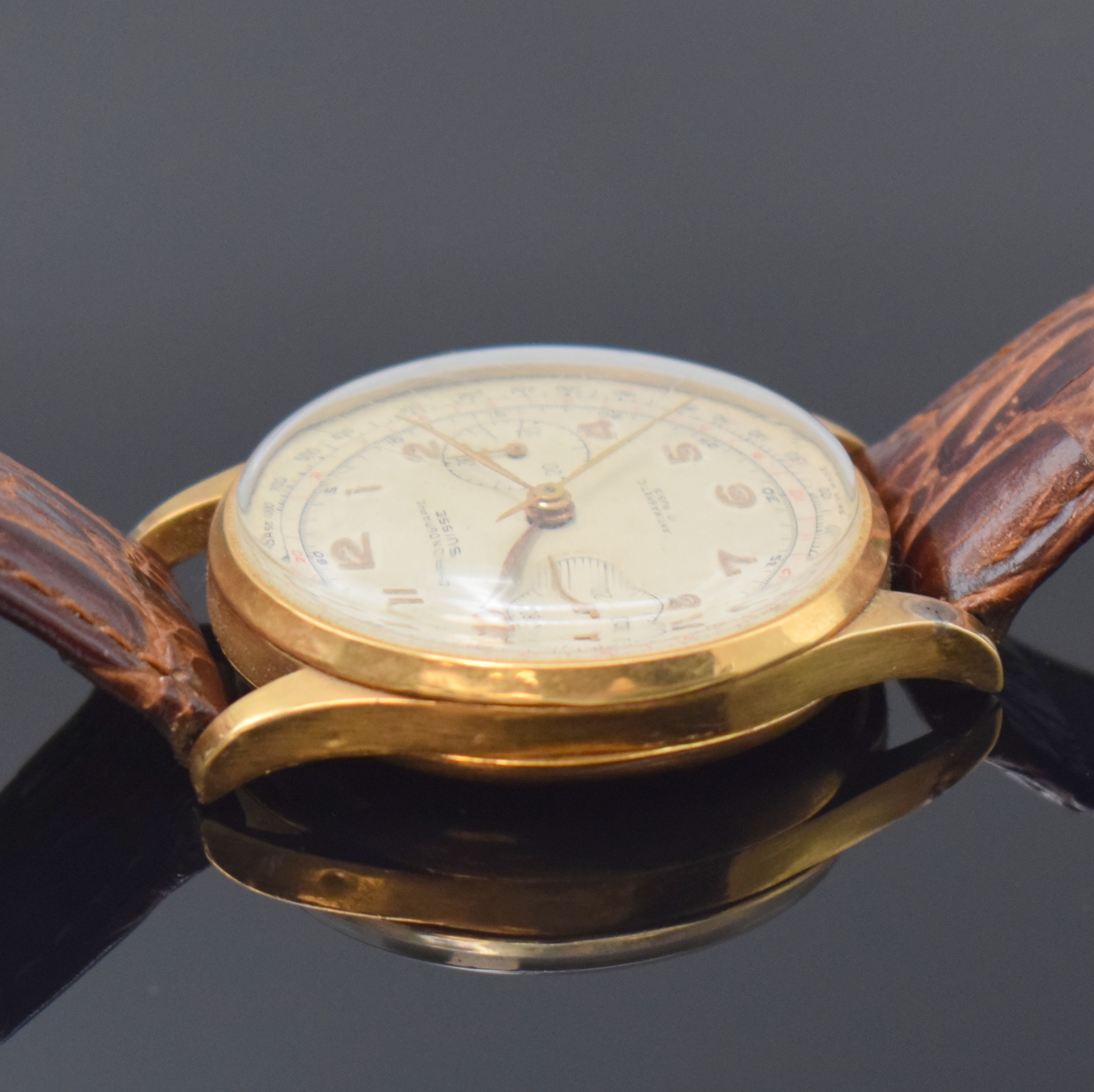 Detail c: CHRONOGRAPHE SUISSE Herrenarmbanduhr mit Chronograph in RG 750/000, Schweiz um 1950, Handaufzug, 3-teil. Geh. dell., Boden und Glasrand aufgedr., ...