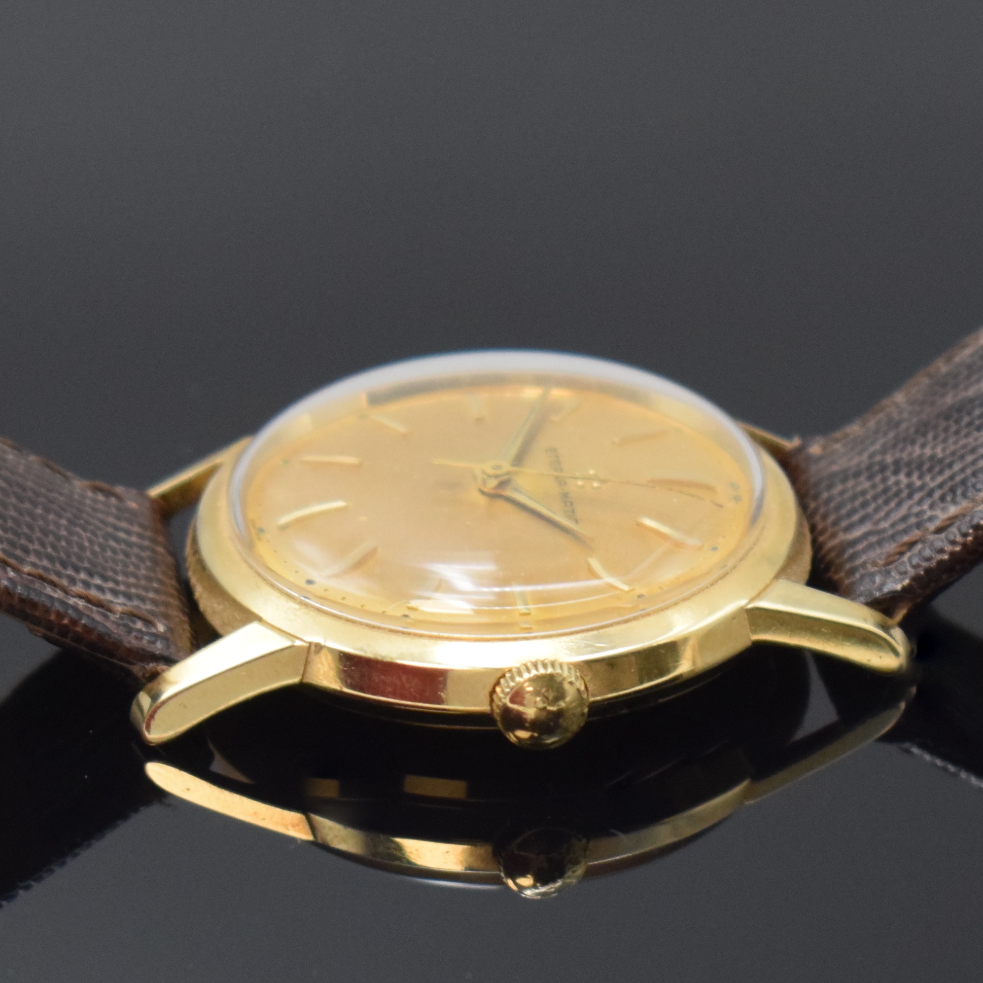 Detail b: ETERNA-MATIC Armbanduhr in GG 585/000, Schweiz um 1960, Boden verschr., Zifferbl. m. aufges. gold. Indizes altersbed. fl./pat., gold. Zeiger, rhod. ...