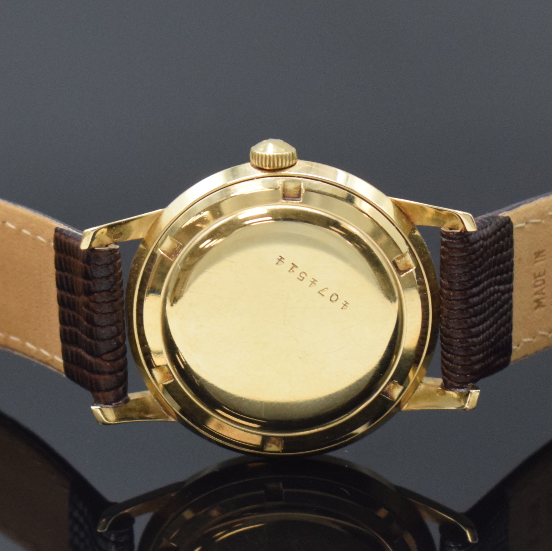 Detail c: ETERNA-MATIC Armbanduhr in GG 585/000, Schweiz um 1960, Boden verschr., Zifferbl. m. aufges. gold. Indizes altersbed. fl./pat., gold. Zeiger, rhod. ...