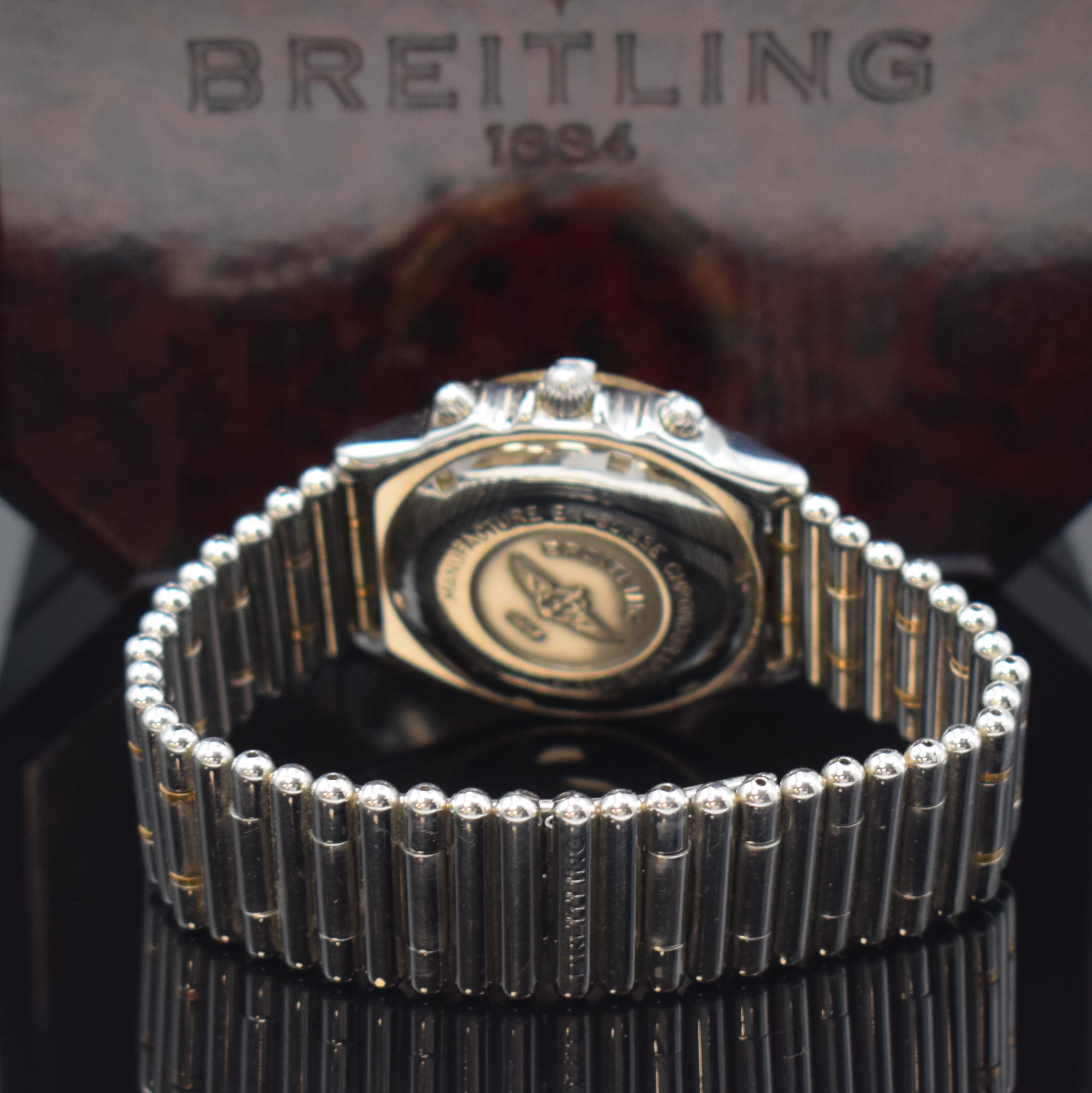 Detail b: BREITLING Chronomat Herrenarmbanduhr Referenz C13048, Schweiz um 1994, Automatik, Geh. in Edelstahl/Rosegold komb. inkl. orig. Roleauxband m. dopp. ...