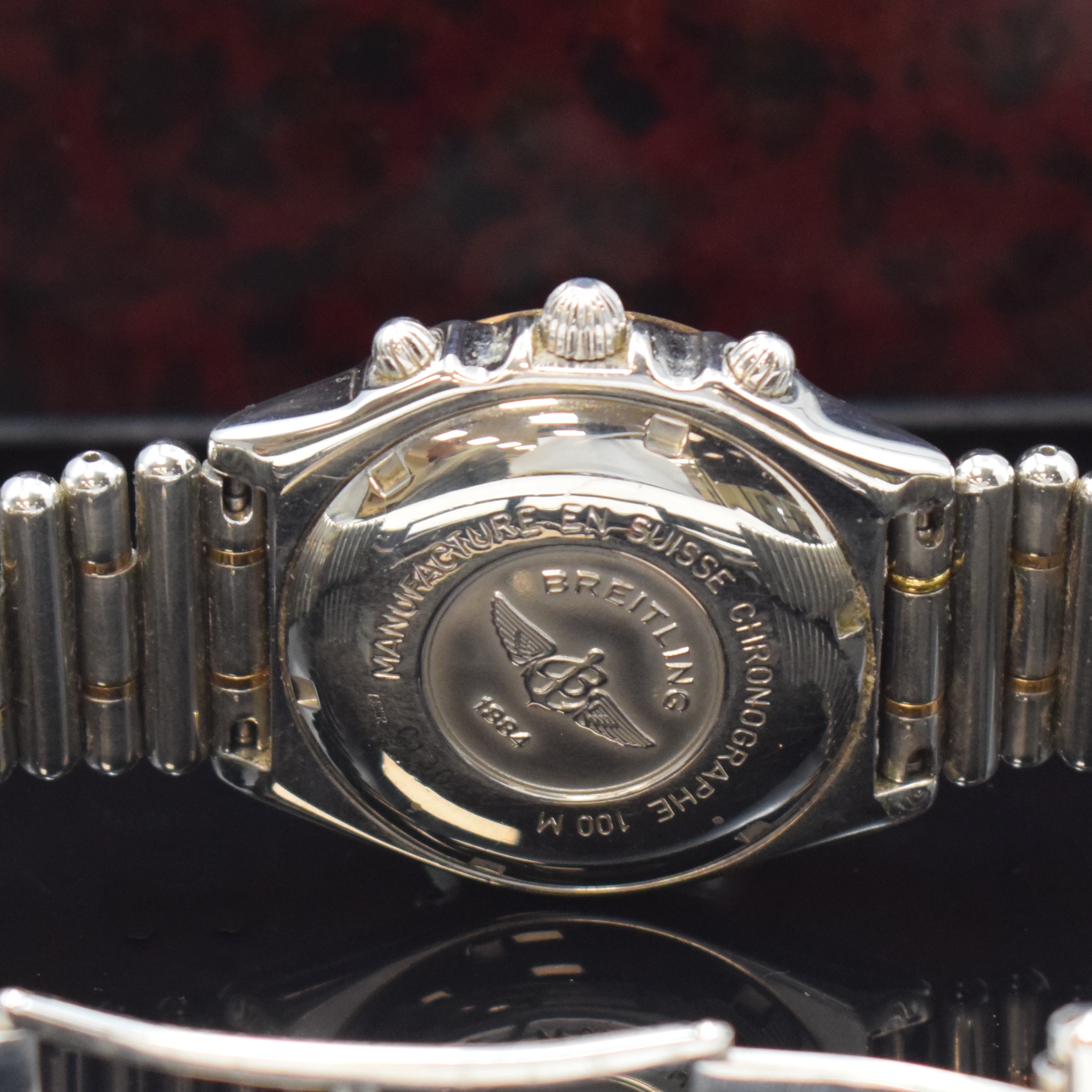 Detail d: BREITLING Chronomat Herrenarmbanduhr Referenz C13048, Schweiz um 1994, Automatik, Geh. in Edelstahl/Rosegold komb. inkl. orig. Roleauxband m. dopp. ...