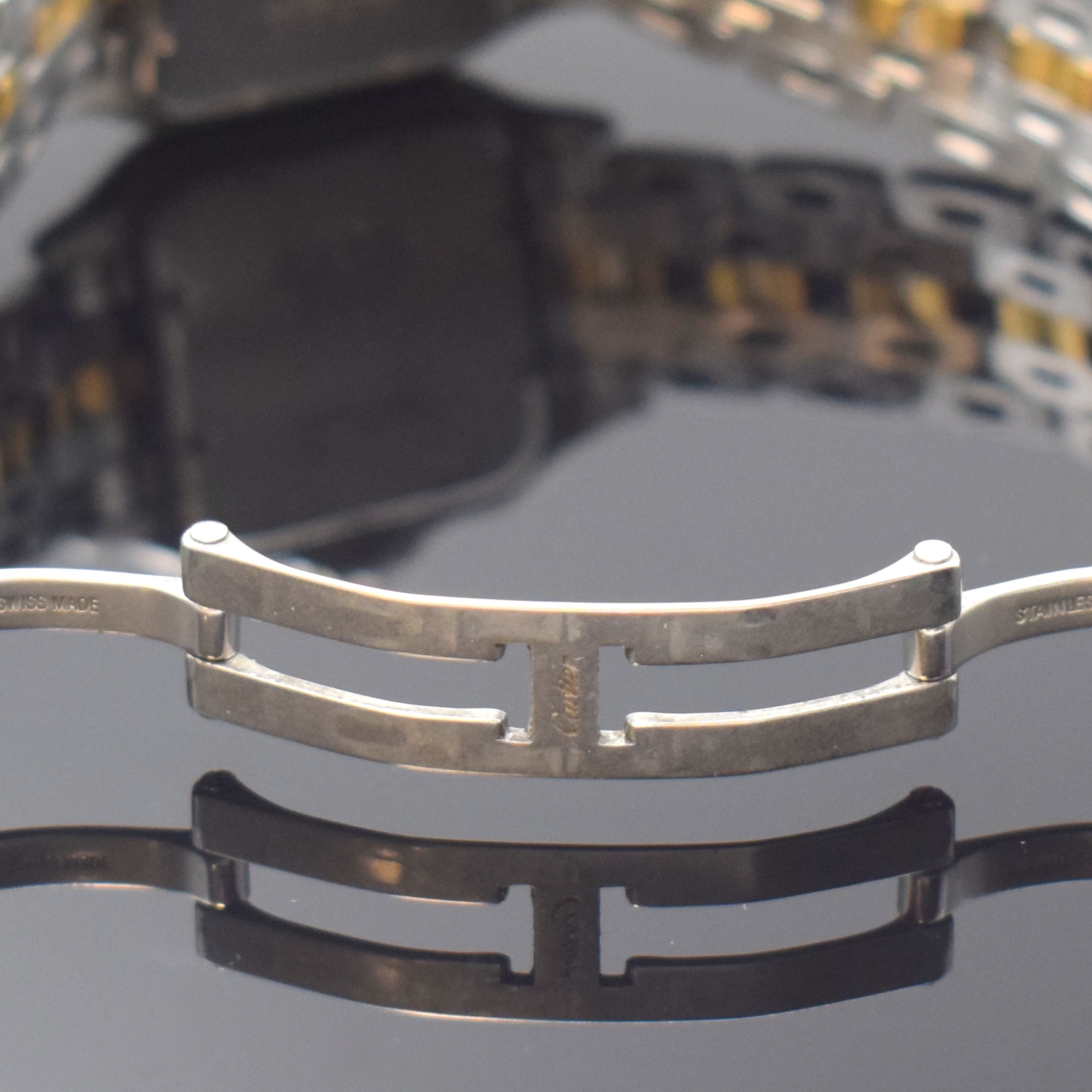 Detail b: CARTIER Panthere Damenarmbanduhr in Stahl/Gold kombiniert, Schweiz um 1995, quarz, Boden 8-fach verschr., Gliederband m. dopp. Faltschl., ...