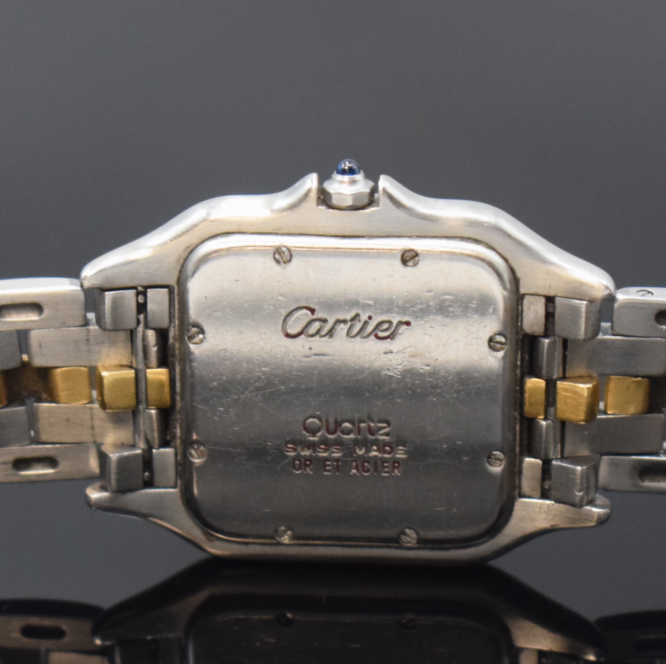 Detail d: CARTIER Panthere Damenarmbanduhr in Stahl/Gold kombiniert, Schweiz um 1995, quarz, Boden 8-fach verschr., Gliederband m. dopp. Faltschl., ...
