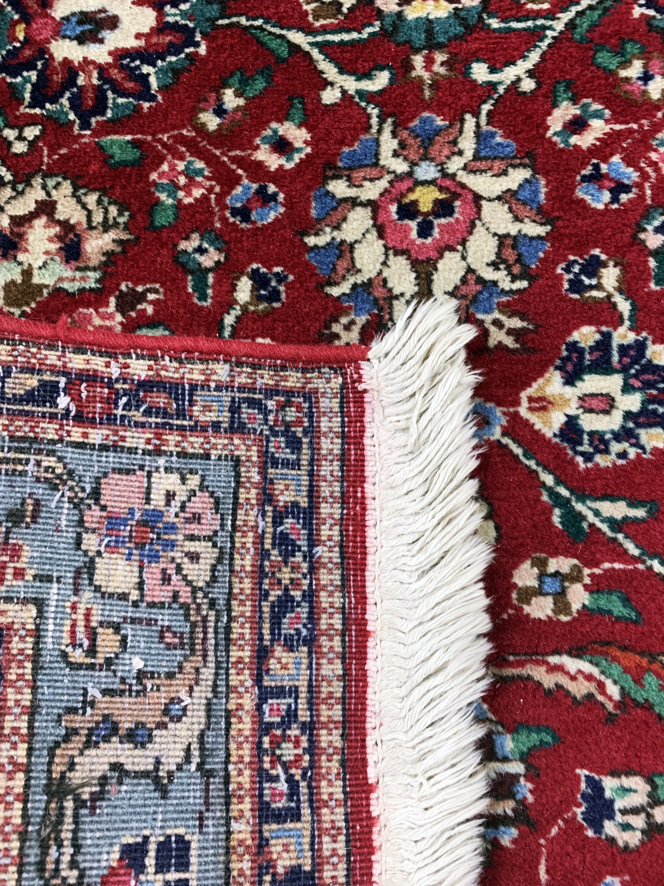 Detail e: Täbriz alt, Persien, Mitte 20.Jhd, Wolle auf Baumwolle, ca. 470 x 117 cm, EHZ: 2