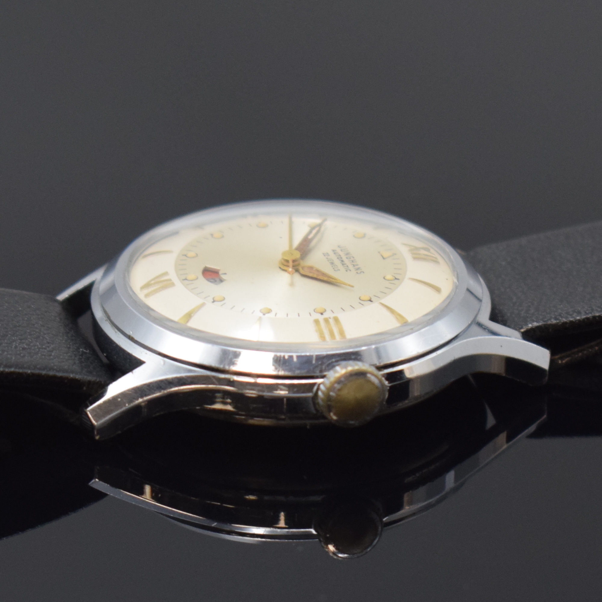 Detail b: JUNGHANS Herrenarmbanduhr mit Gangreserveanzeige Kaliber 80/12, Deutschland um 1950, Automatik, verchr. Geh., Boden verschr., silb. Zifferbl. m. ...