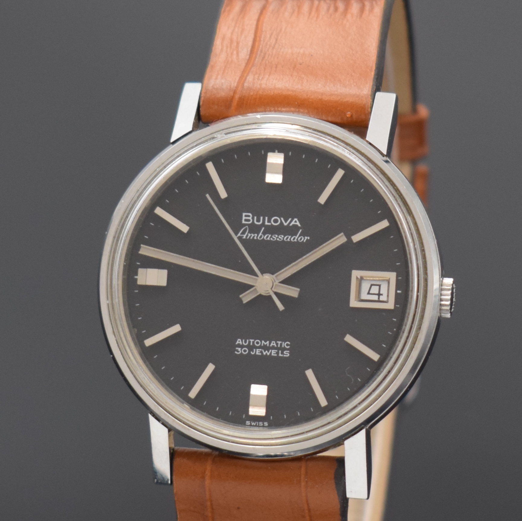 Detail a: BULOVA Ambassador unpolierte Herrenarmbanduhr mit Mikrorotor-Werk, Schweiz um 1965, Automatik, Monocoque-Geh. in Edelstahl, schwarzes Zifferbl. m. ...