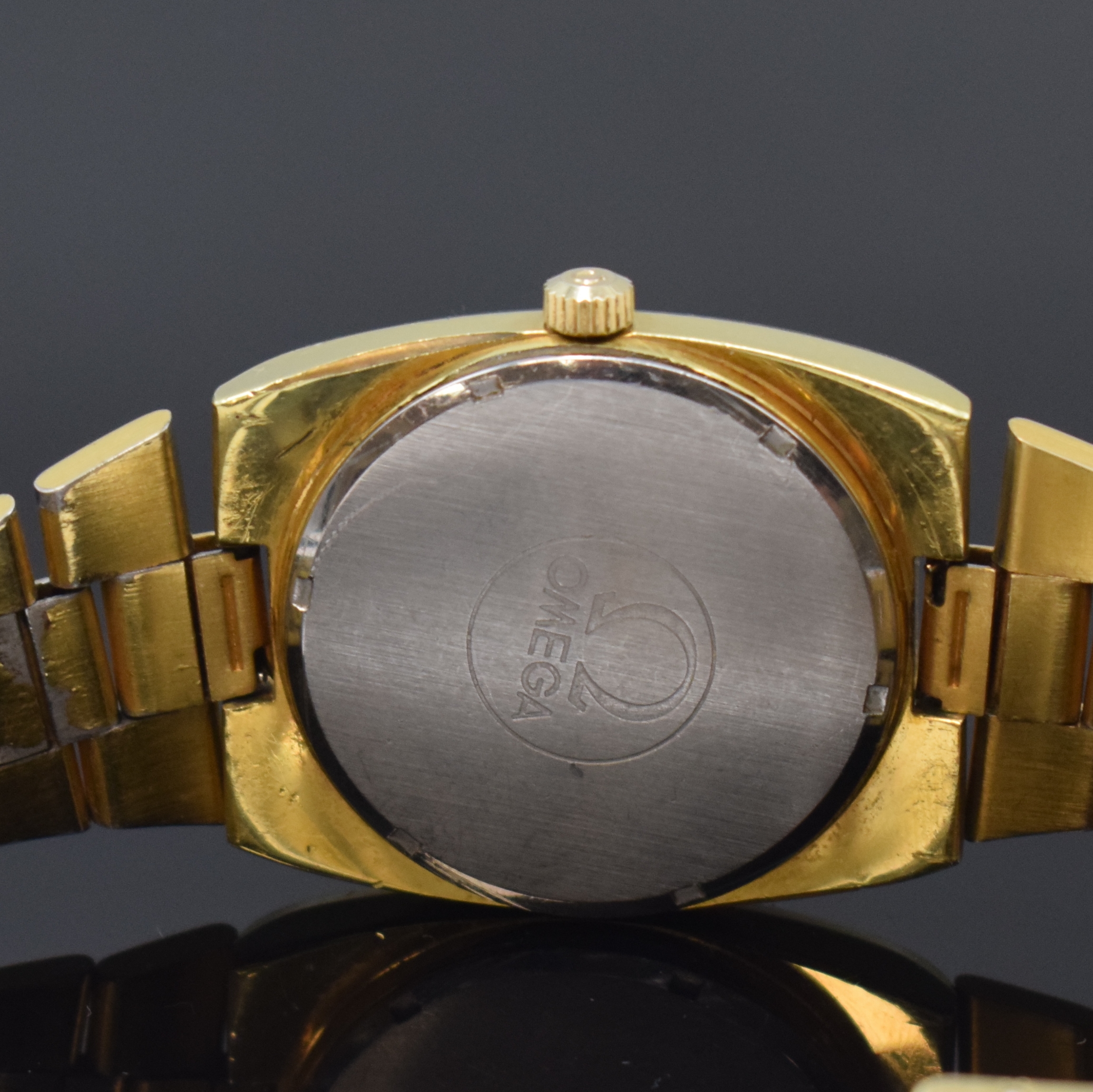 Detail d: OMEGA Herrenarmbanduhr Geneve Referenz 166.0191/366.0835, Automatik, Schweiz um 1974, verg. Metallgeh. inkl. orig. Gliederband (verg. teil. fehlend), ...