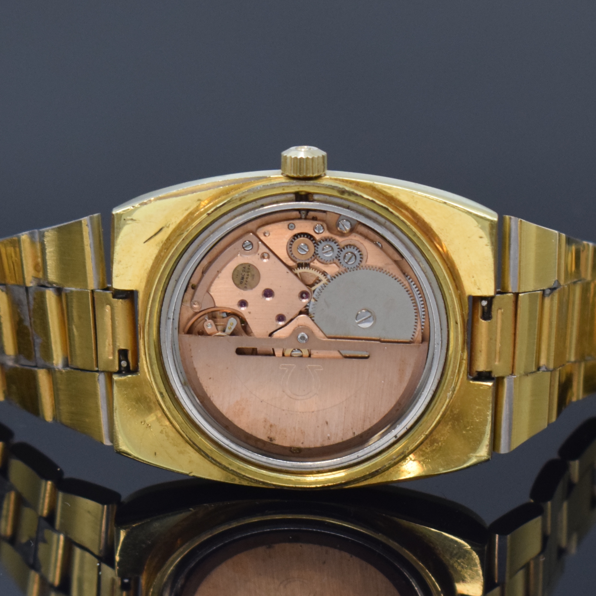 Detail e: OMEGA Herrenarmbanduhr Geneve Referenz 166.0191/366.0835, Automatik, Schweiz um 1974, verg. Metallgeh. inkl. orig. Gliederband (verg. teil. fehlend), ...