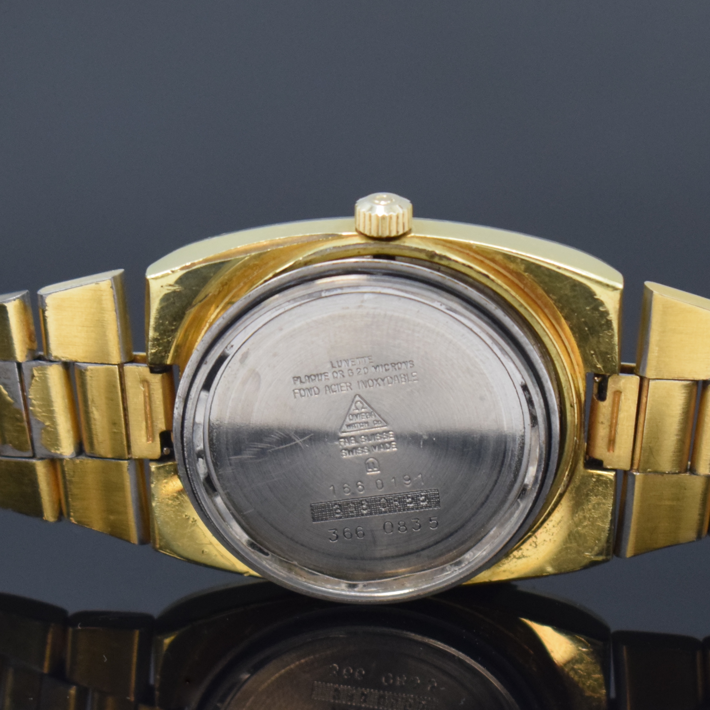 Detail g: OMEGA Herrenarmbanduhr Geneve Referenz 166.0191/366.0835, Automatik, Schweiz um 1974, verg. Metallgeh. inkl. orig. Gliederband (verg. teil. fehlend), ...