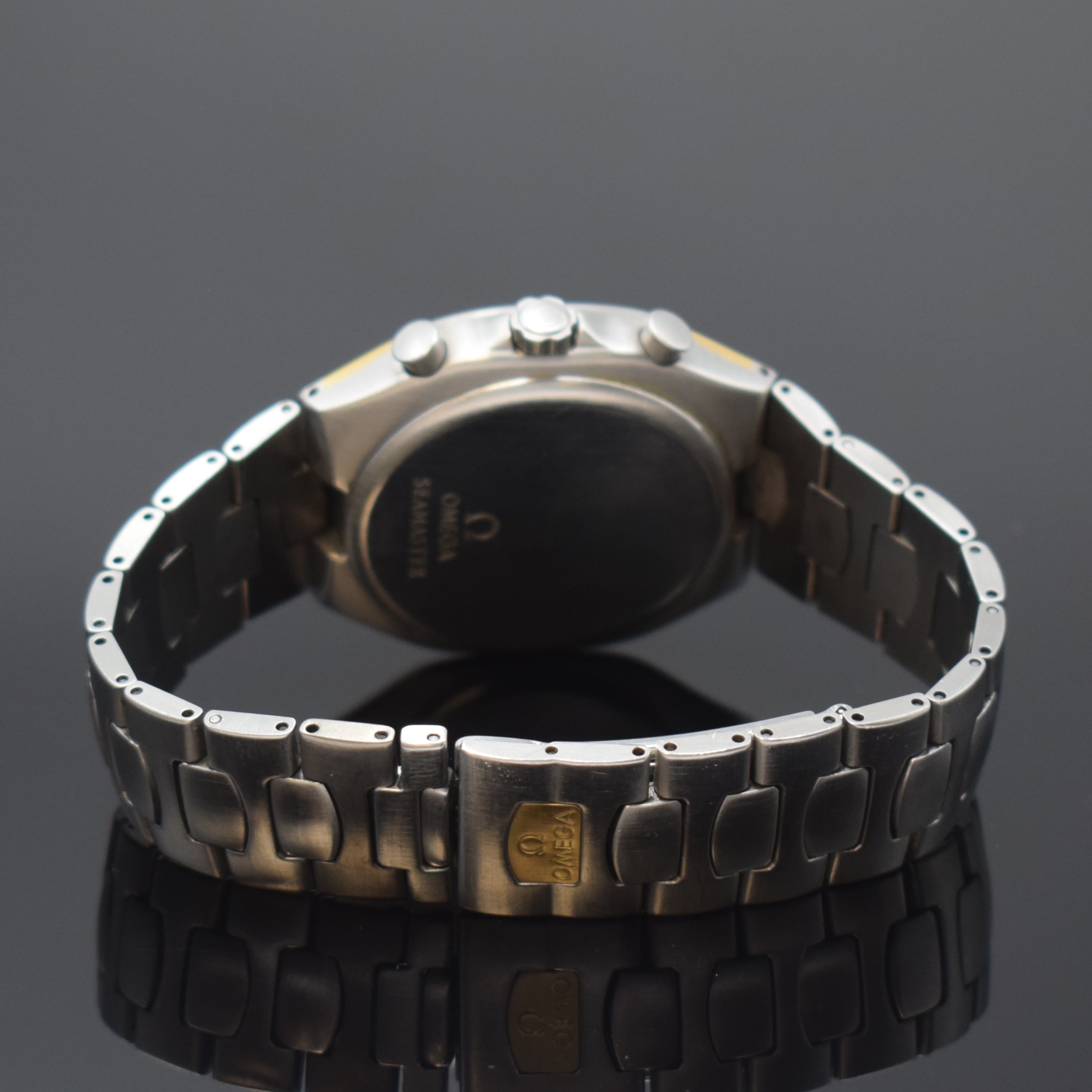 Detail b: OMEGA Seamaster Polaris Armbandchronograph Referenz 386.1031, Schweiz um 1990, quarz, goldintarsiertes Edelstahlgeh. inkl. Edelstahlgliederband m. ...