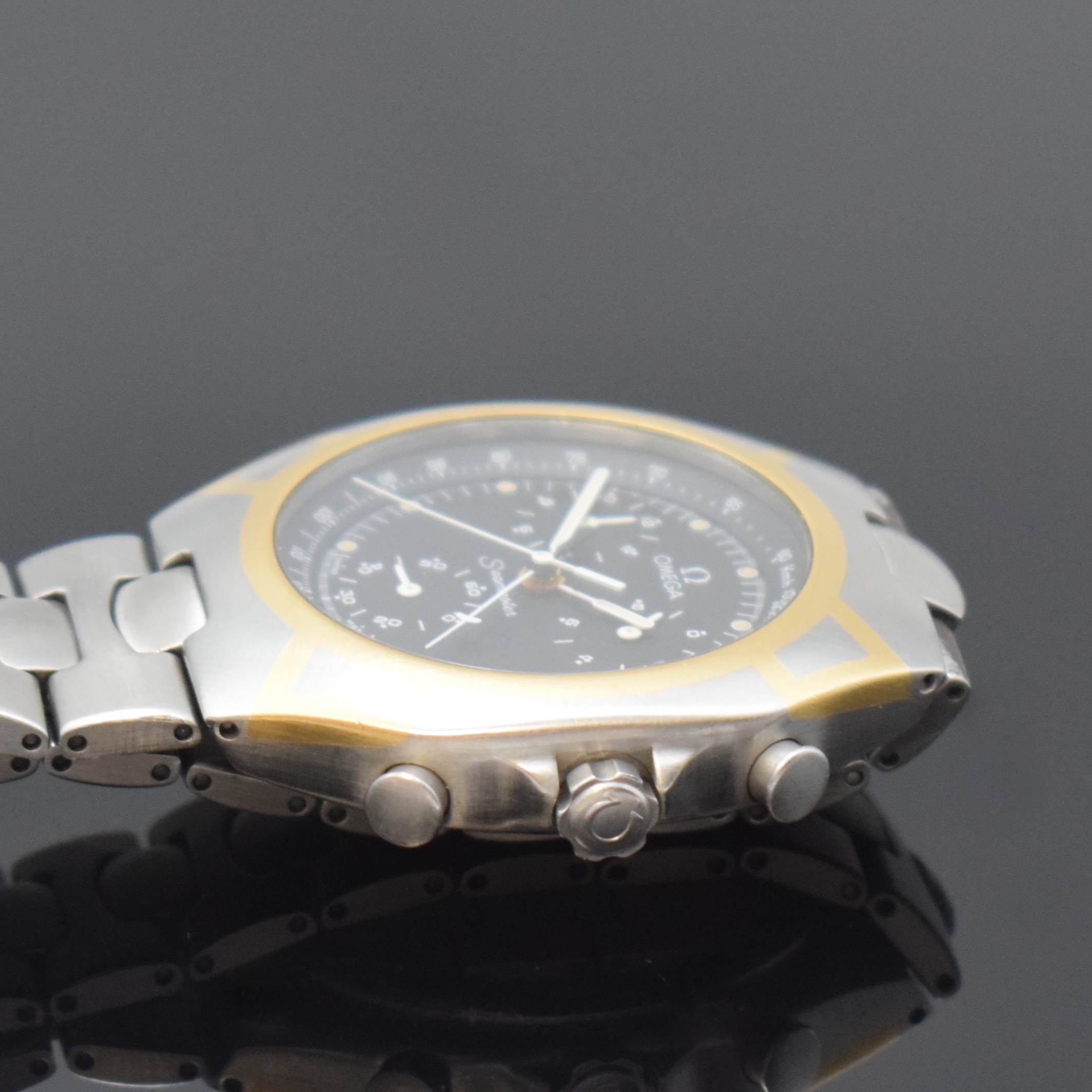 Detail c: OMEGA Seamaster Polaris Armbandchronograph Referenz 386.1031, Schweiz um 1990, quarz, goldintarsiertes Edelstahlgeh. inkl. Edelstahlgliederband m. ...