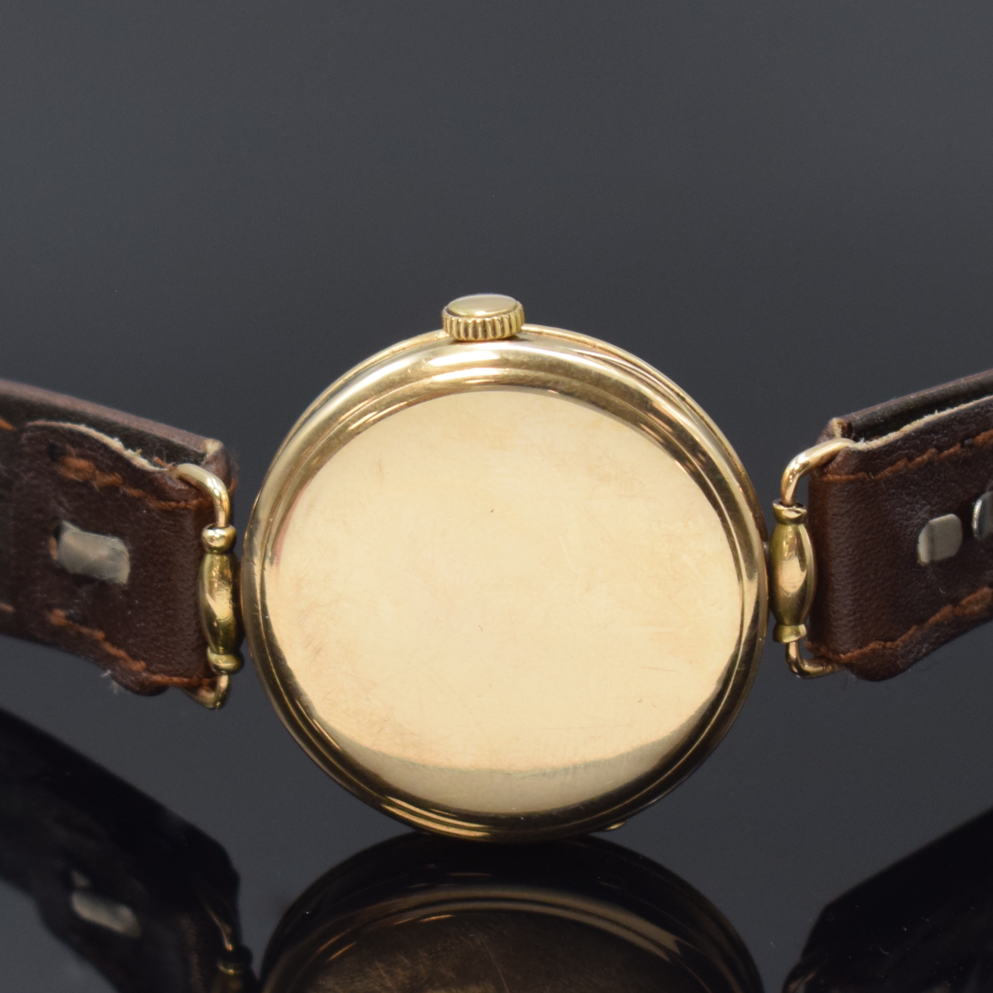 Detail c: CYMA Armbanduhr in GG 585/000, Handaufzug, Schweiz 1920er Jahre, Geh. m. Scharnierboden altersbed. dell., bewegl. Bandanst., Emailzifferbl. m. arab. ...
