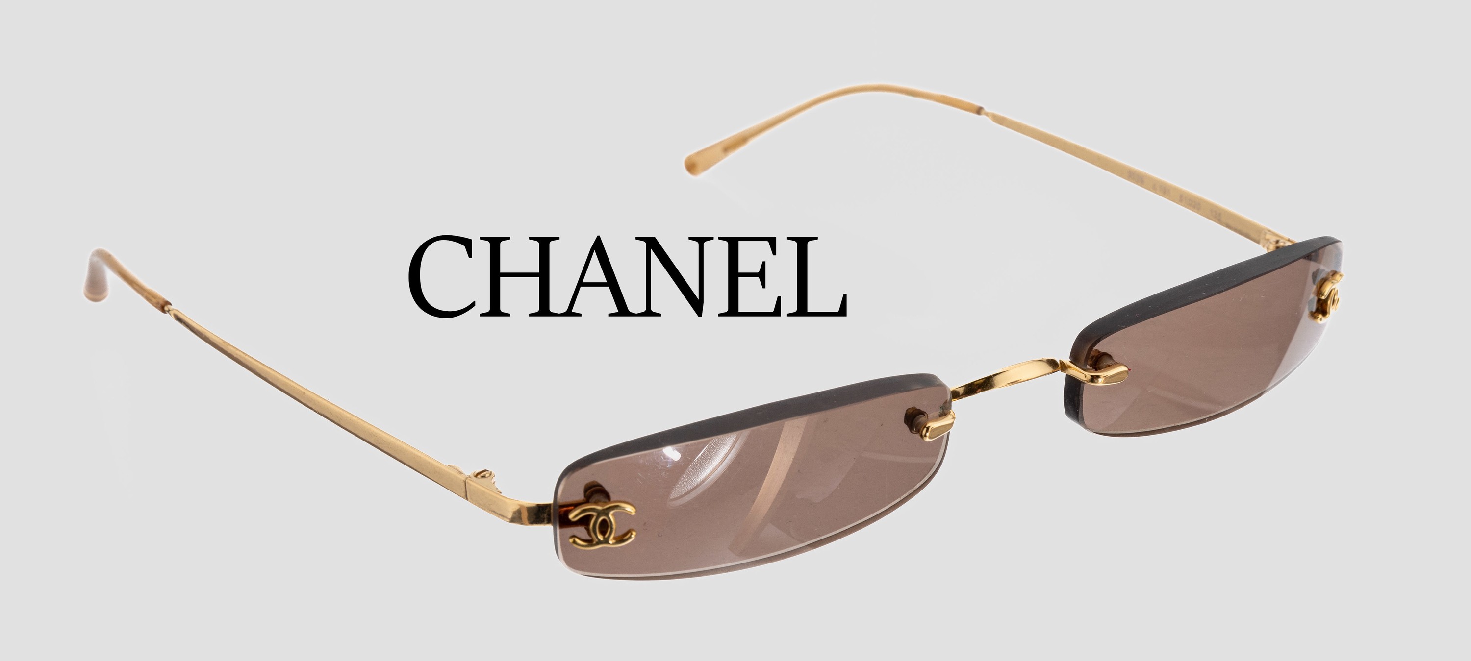 CHANEL Lese-Sonnenbrille, vergoldet, Gläser mit Lesestärke, orig. Etui und Brillen-Putztuch, Gebr.-Spuren