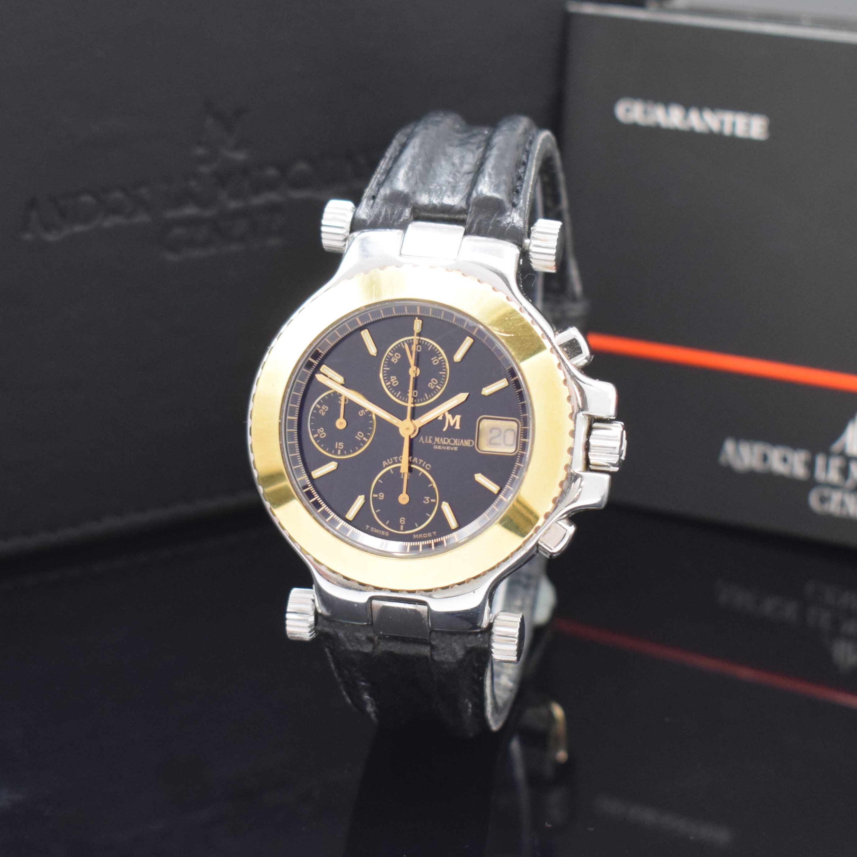 ANDRE LE MARQUAND Herrenchronograph in Stahl/Gold, Schweiz um 1994, Automatik, beids. vergl. Geh., Boden u. Krone verschr., Lünette in 18k Gold, ...