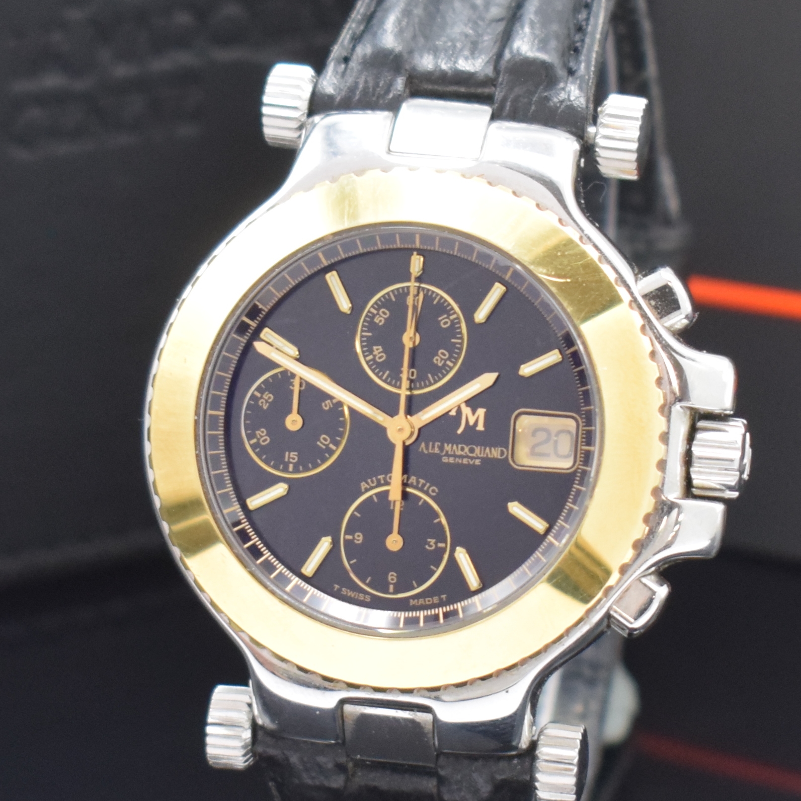 Detail a: ANDRE LE MARQUAND Herrenchronograph in Stahl/Gold, Schweiz um 1994, Automatik, beids. vergl. Geh., Boden u. Krone verschr., Lünette in 18k Gold, ...