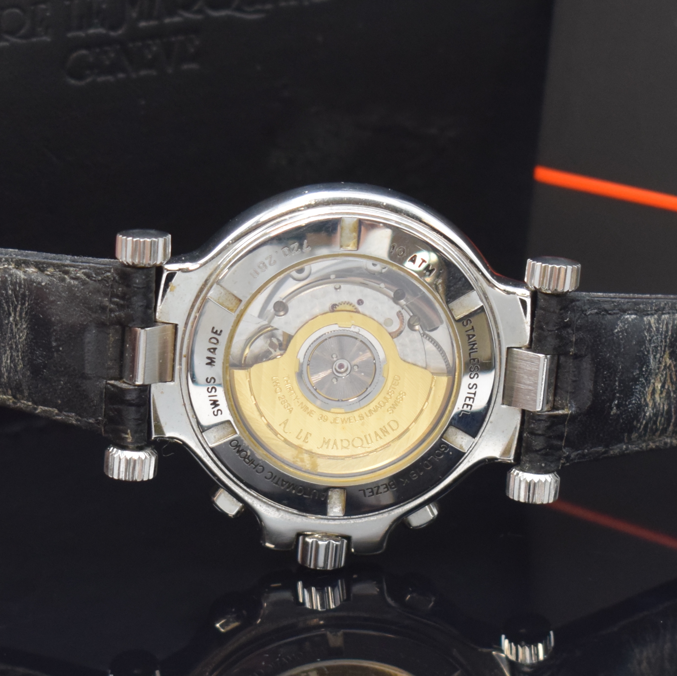 Detail e: ANDRE LE MARQUAND Herrenchronograph in Stahl/Gold, Schweiz um 1994, Automatik, beids. vergl. Geh., Boden u. Krone verschr., Lünette in 18k Gold, ...