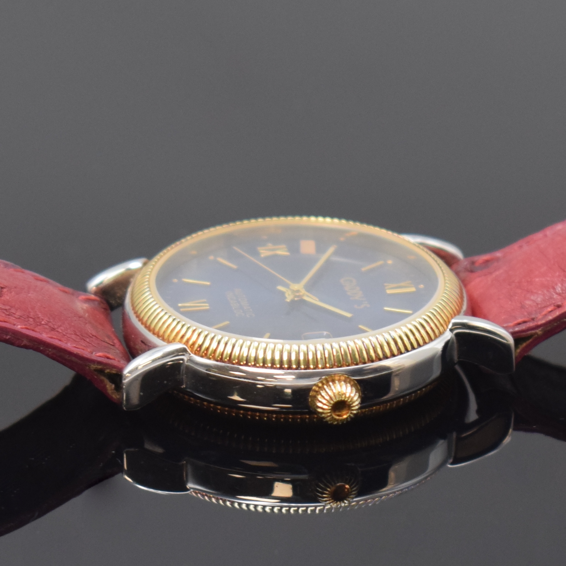 Detail b: GADDY'S Herrenarmbanduhr in Stahl, Schweiz um 2000, Automatik, beids. vergl. Geh., Boden verschr., blaues Zifferbl. m. gold. Std.-Ind. u. röm. ...