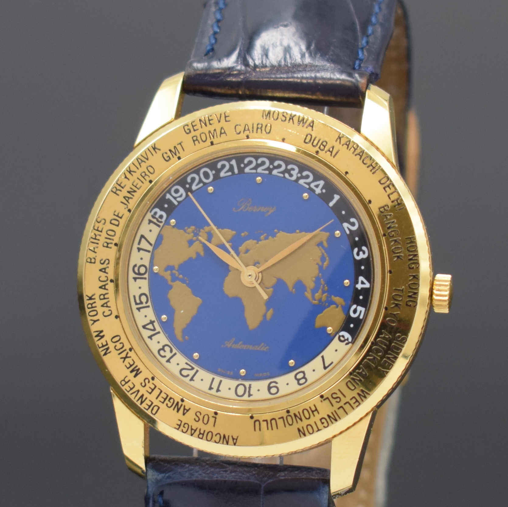 Detail a: BERNEY Herrenarmbanduhr mit Weltzeitanzeige, Schweiz um 1990, Automatik, verg. Geh., Stahlboden aufgedr., Lünette m. Weltzeitanzeige beids. drehb., ...