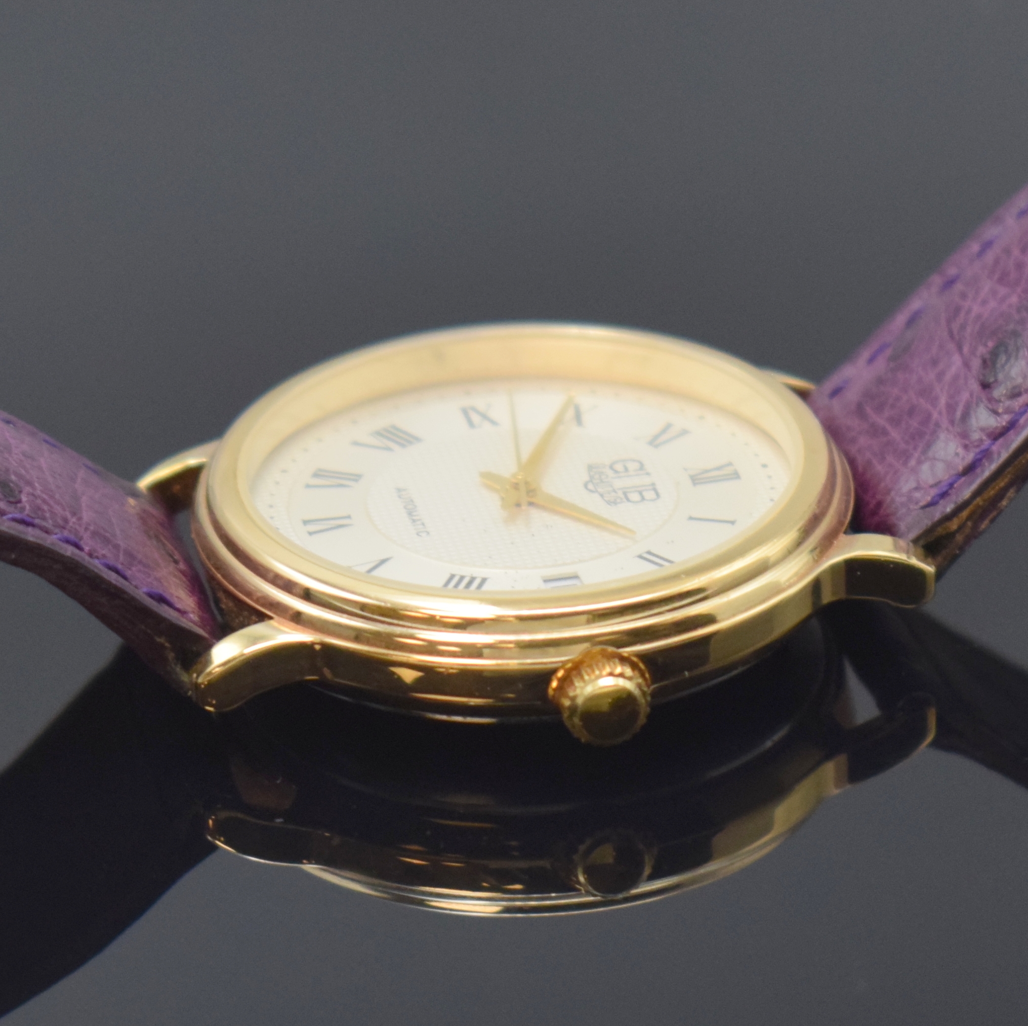 Detail b: GUB Glashütte SA Herrenarmbanduhr, Deutschland um 1990, Automatik, verg. Geh., Stahlboden aufgedr., silb. Zifferbl. teils guill., röm. Zahlen, ...