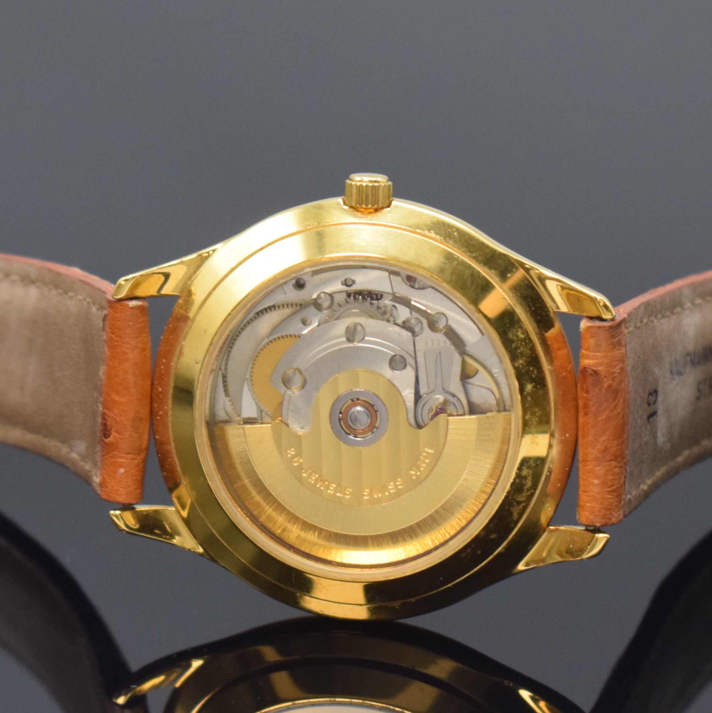 Detail c: Herrenarmbanduhr mit Nussbaum-Zifferblatt, Schweiz um 1990, Automatik, beids. vergl. Geh. verg., Nussbaum-Zifferbl. m. röm. Zahlen, gold. Zeiger, ...